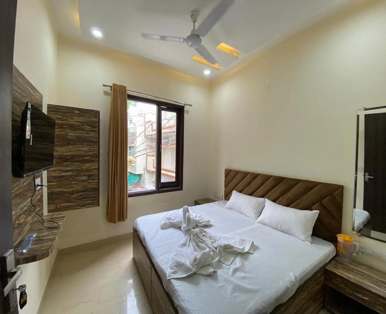 Photo of the whole room, Bed in Naman Homestay