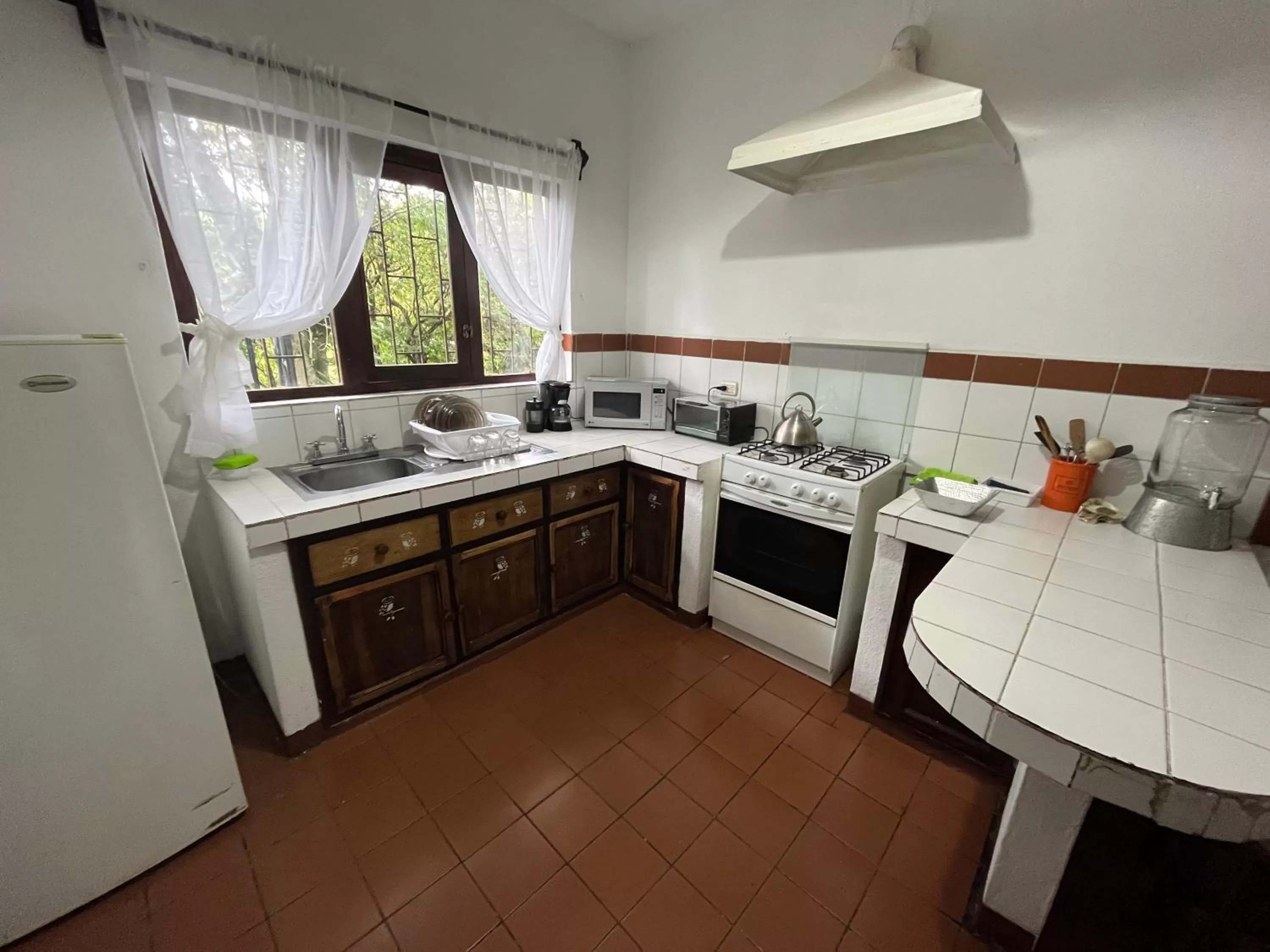 Kitchen/Kitchenette in Apartamentos Otorongo Cuenca Ecuador