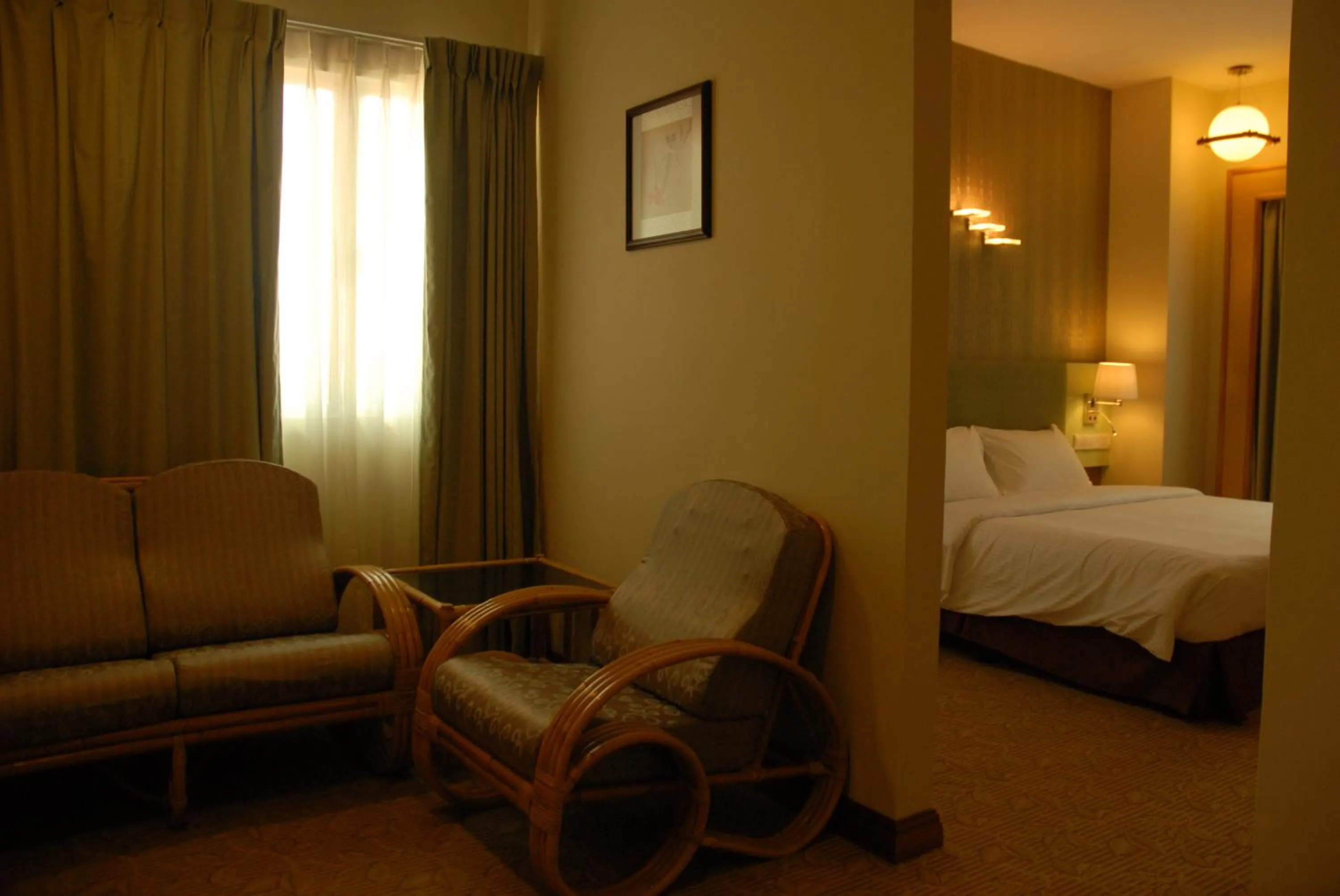 Bed in The Pavilion Hotel