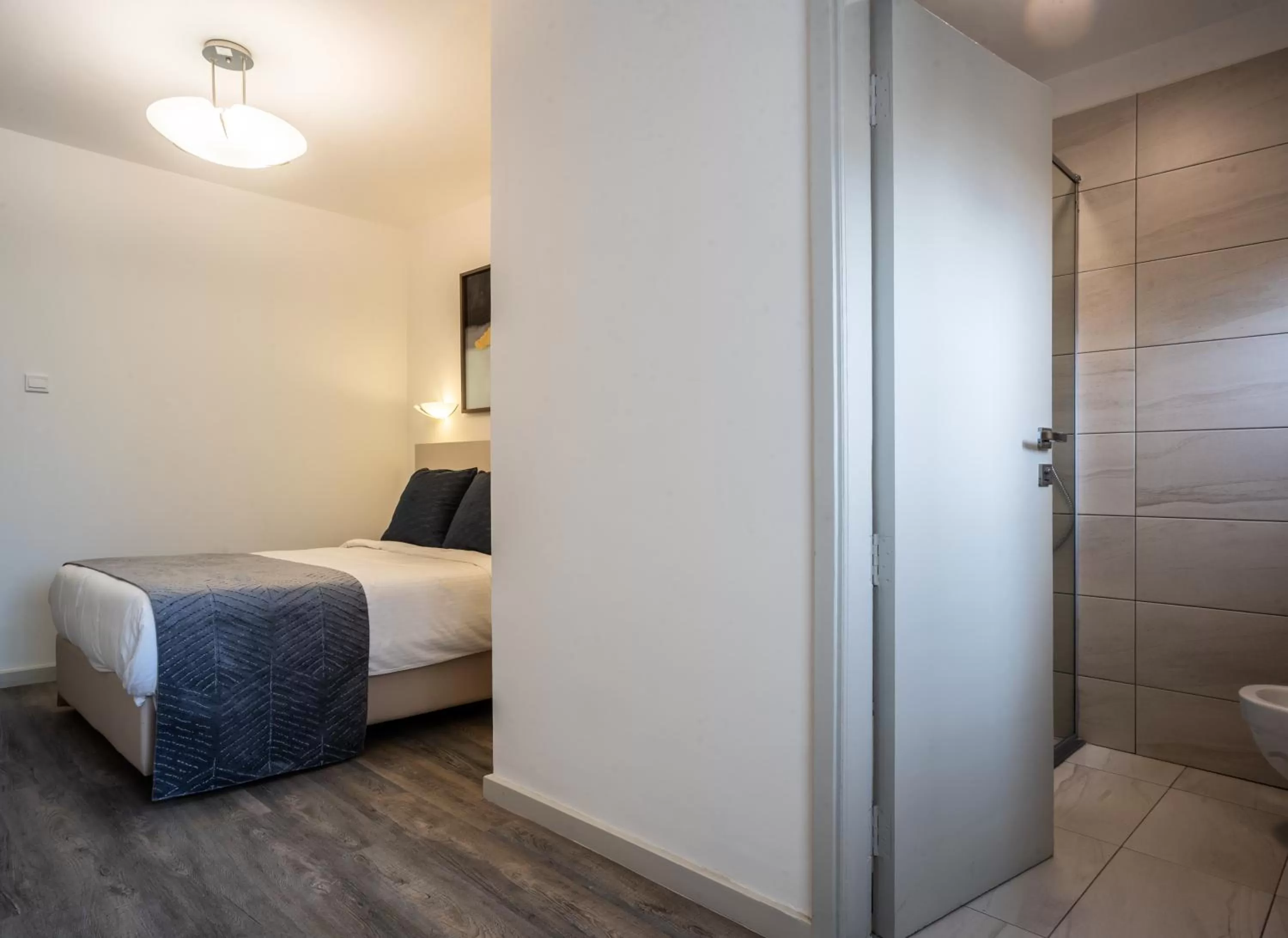 Bedroom, Bed in Yaya Hotel & Apartments