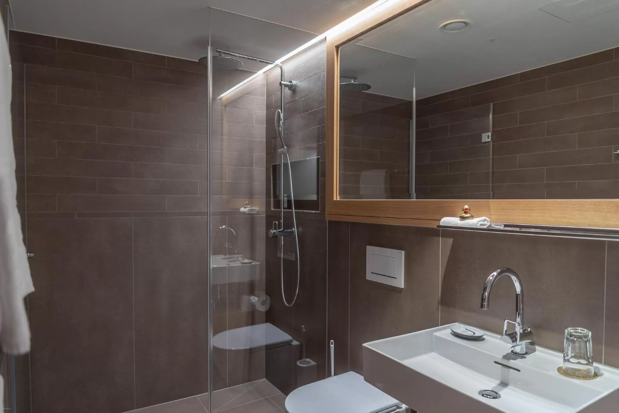 Bathroom in CASPAR Swiss Quality Hotel