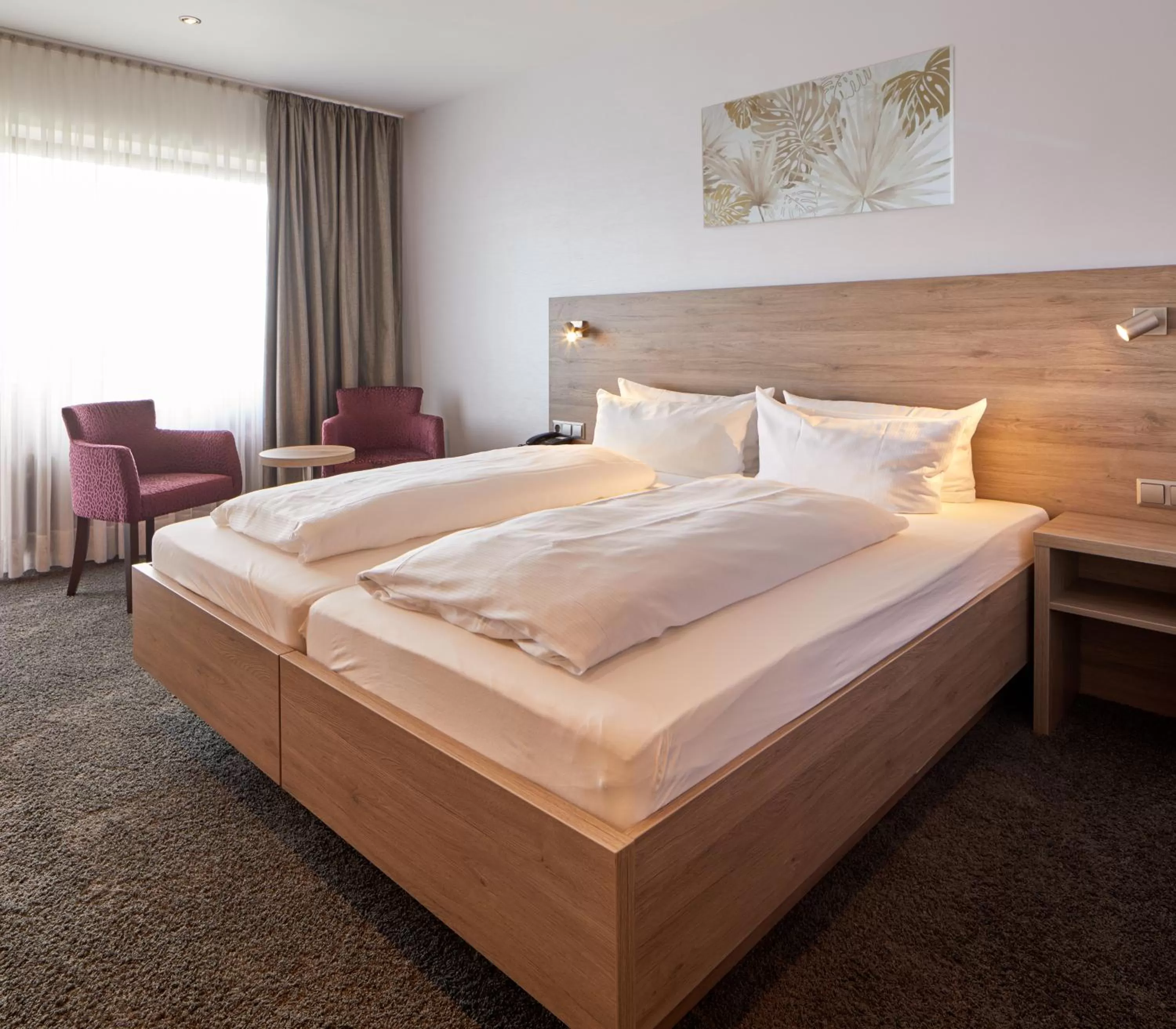 Bed in NaturKulturHotel Stumpf