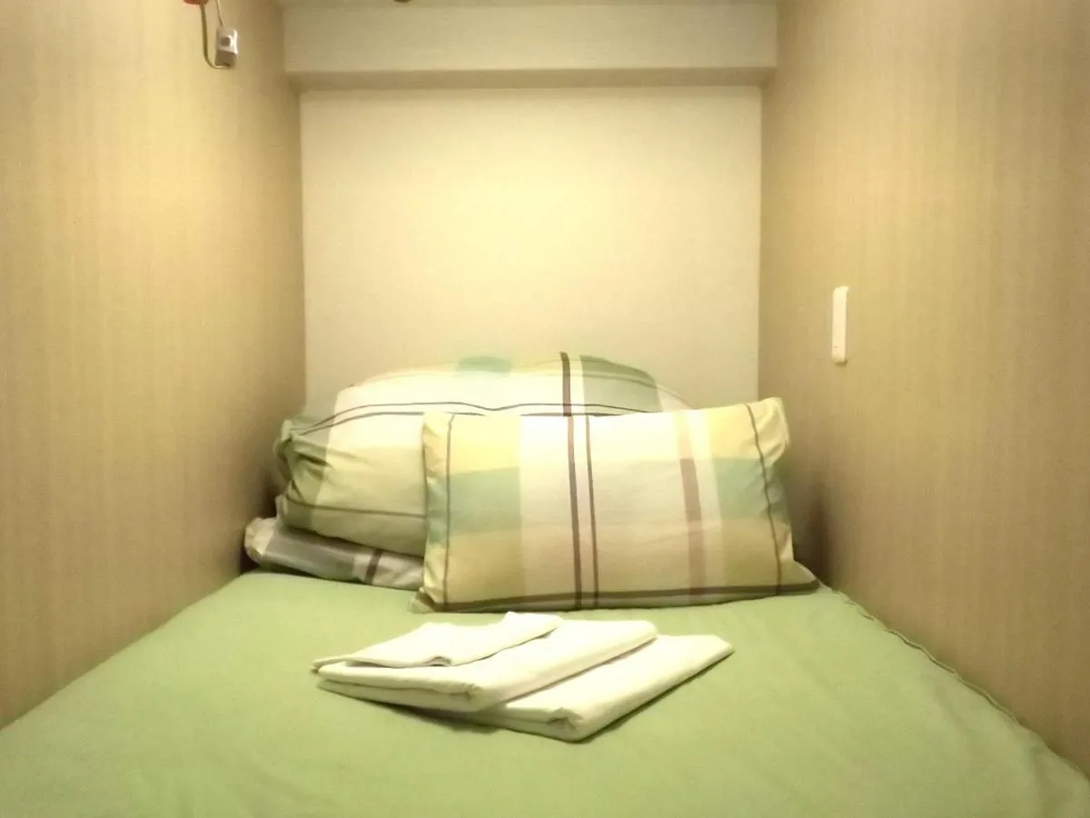Bed in Fukuoka Guesthouse Little Asia Kokura