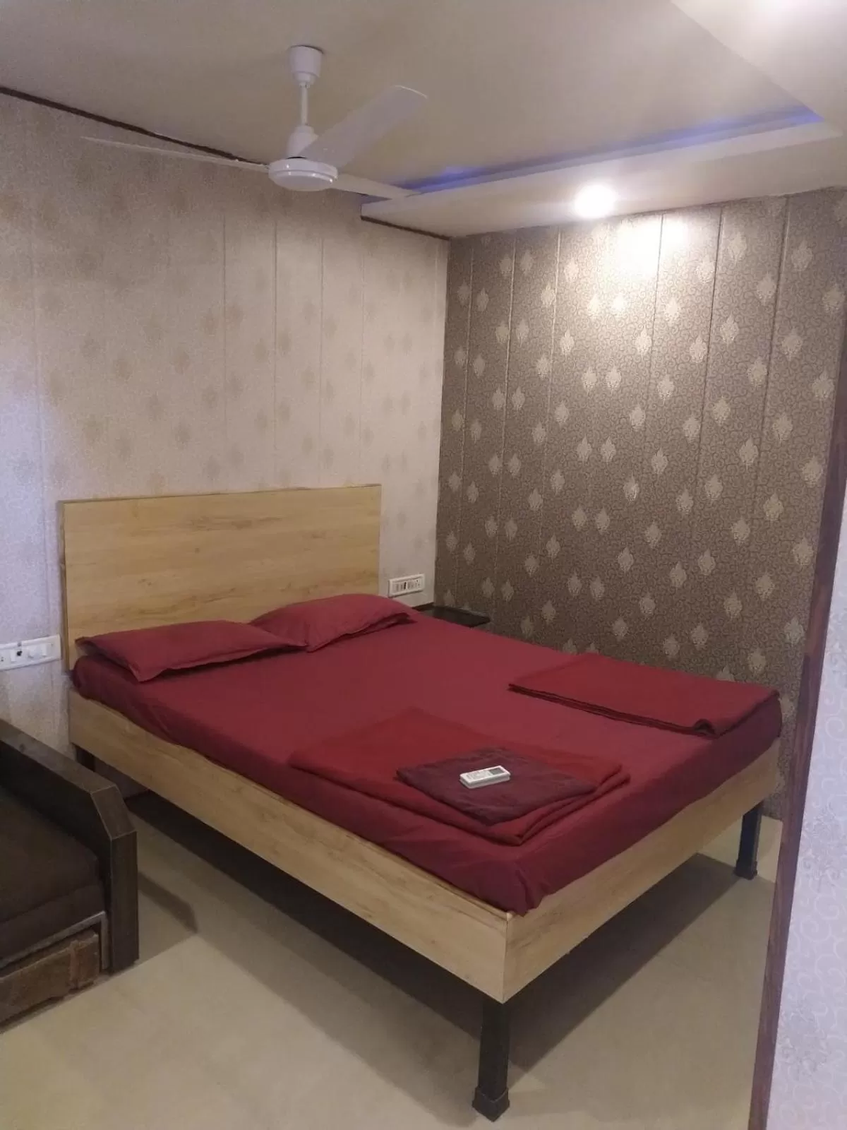 fireplace, Bed in Sayeban Hotel