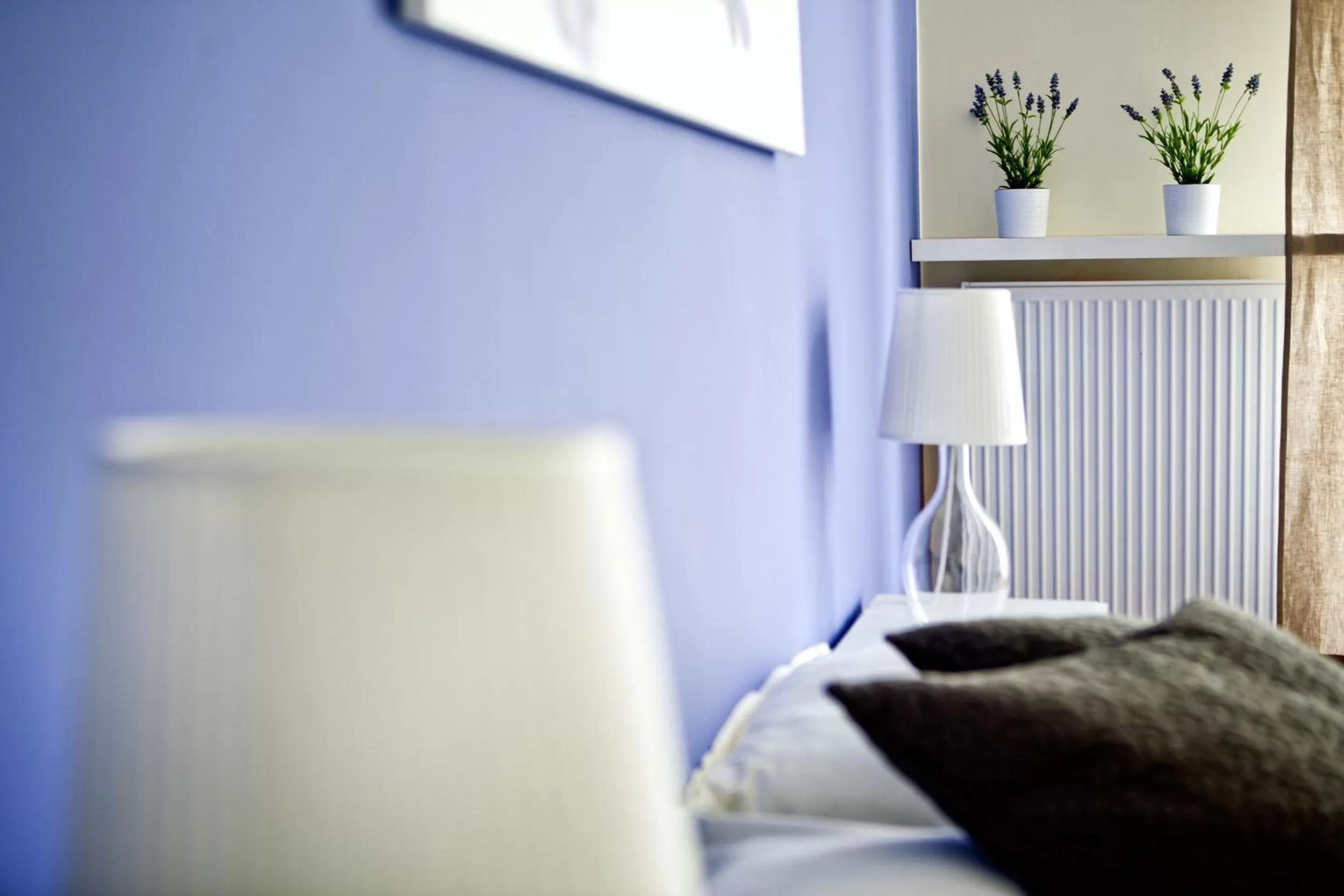 Decorative detail, Bed in 4Seasons﻿ Apartments Cracow