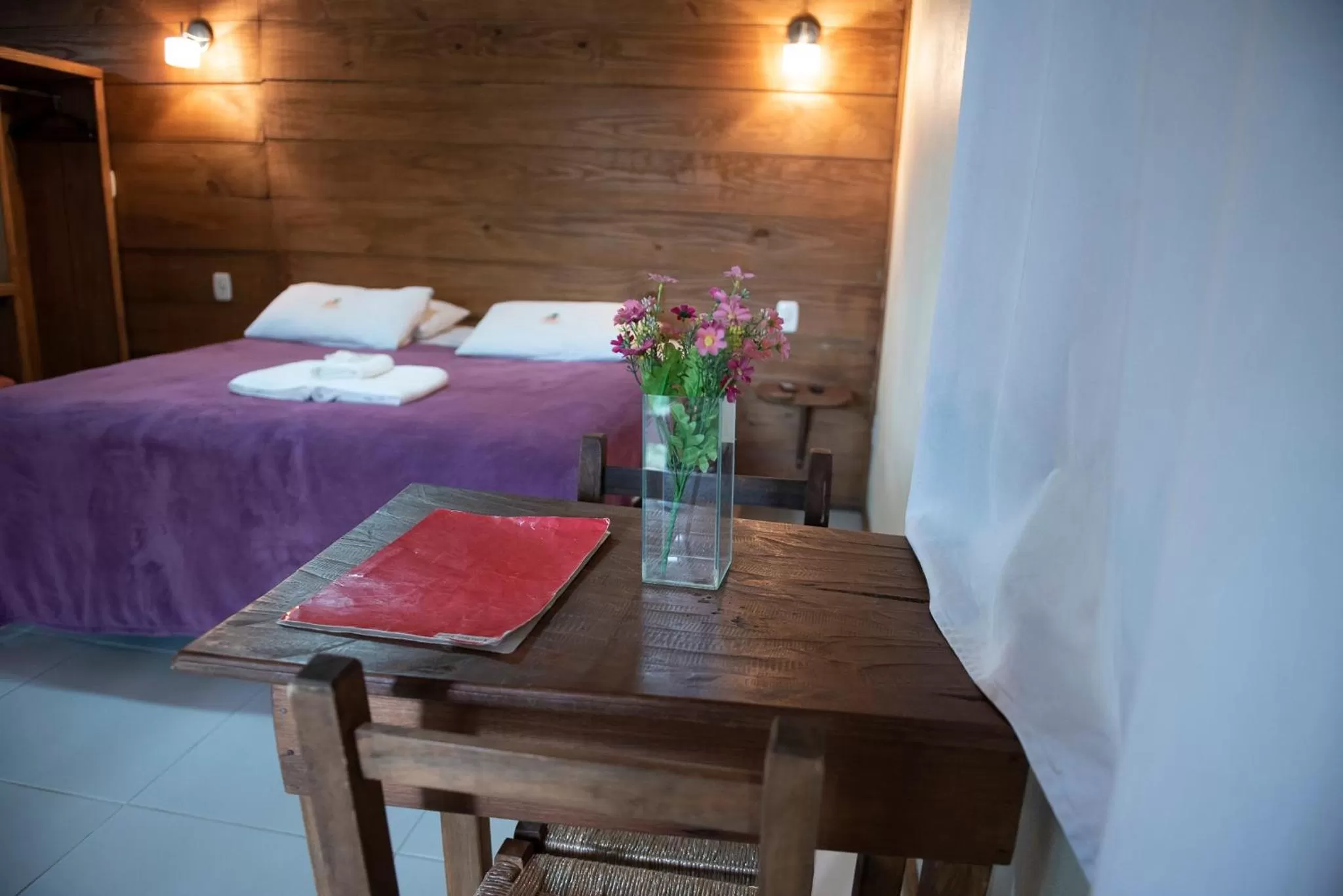 Bed in Pousada da Chacara