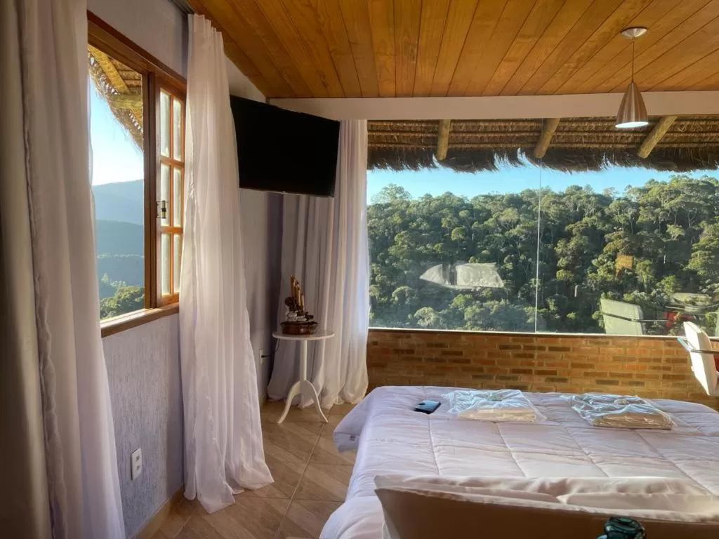 Bed in Pousada R.N.C. Nosso Paraíso