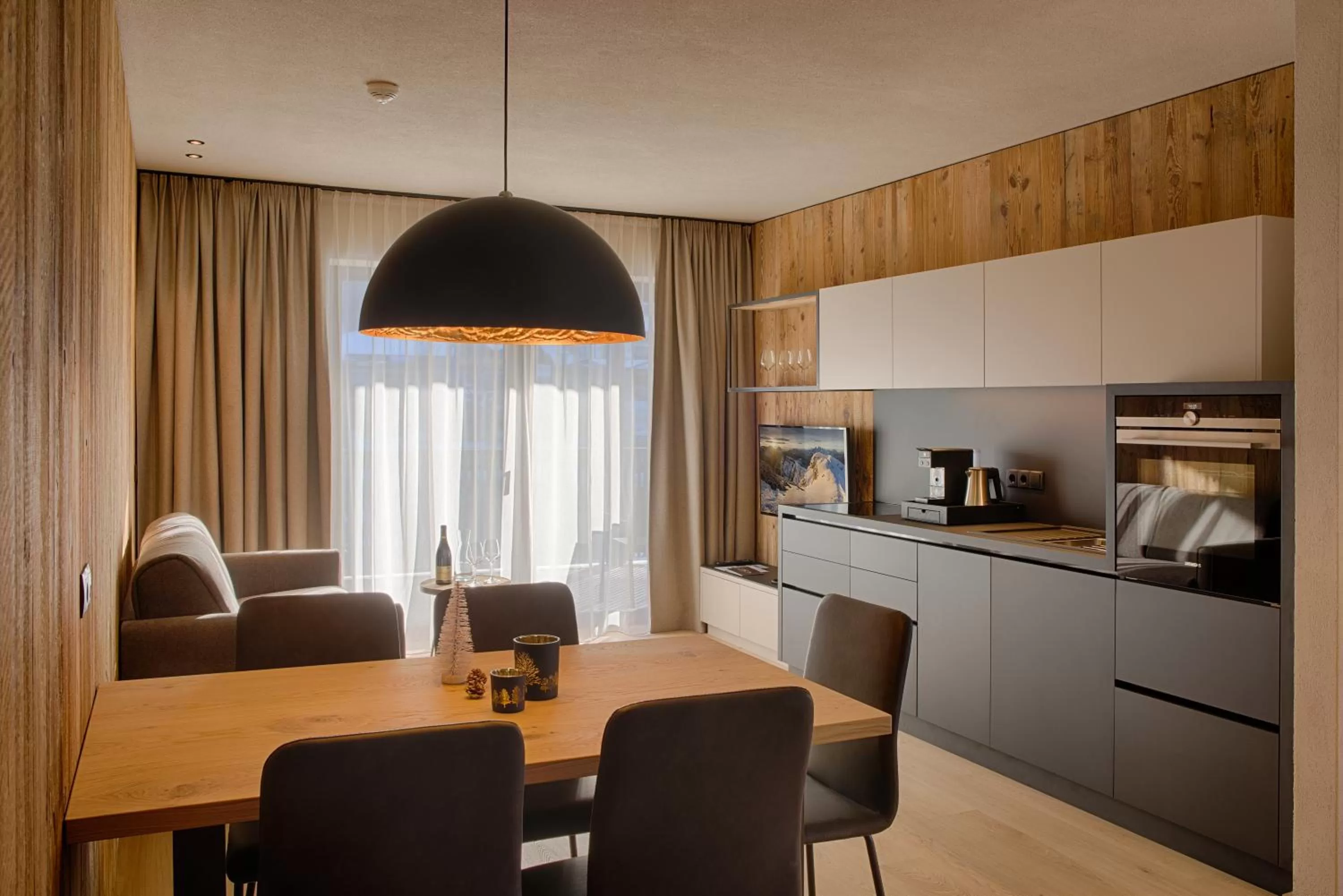 Kitchen or kitchenette in K1 Mountain Chalet - Luxury Apartements