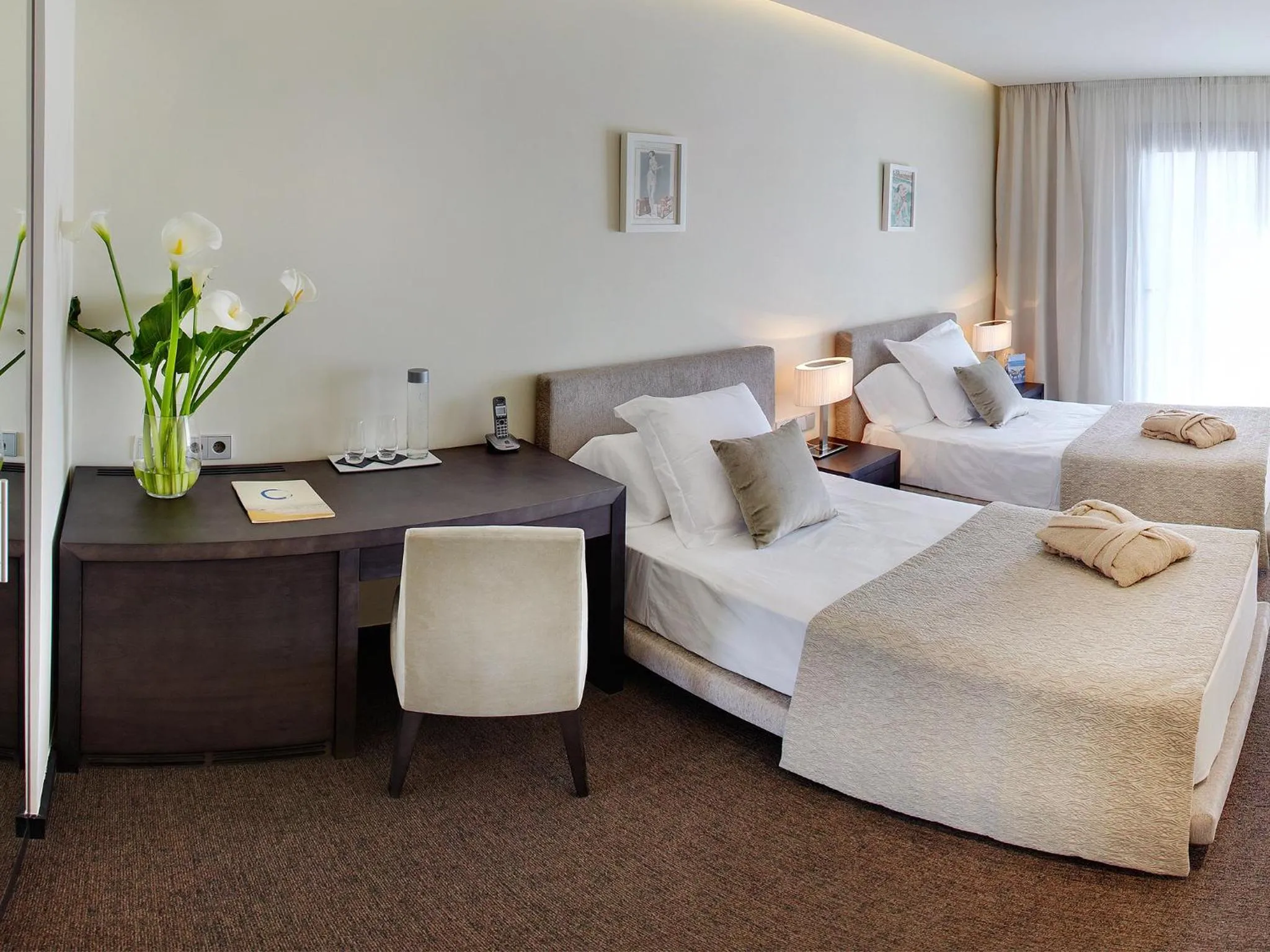 Bed in Cosmopolita Hotel Boutique & Spa