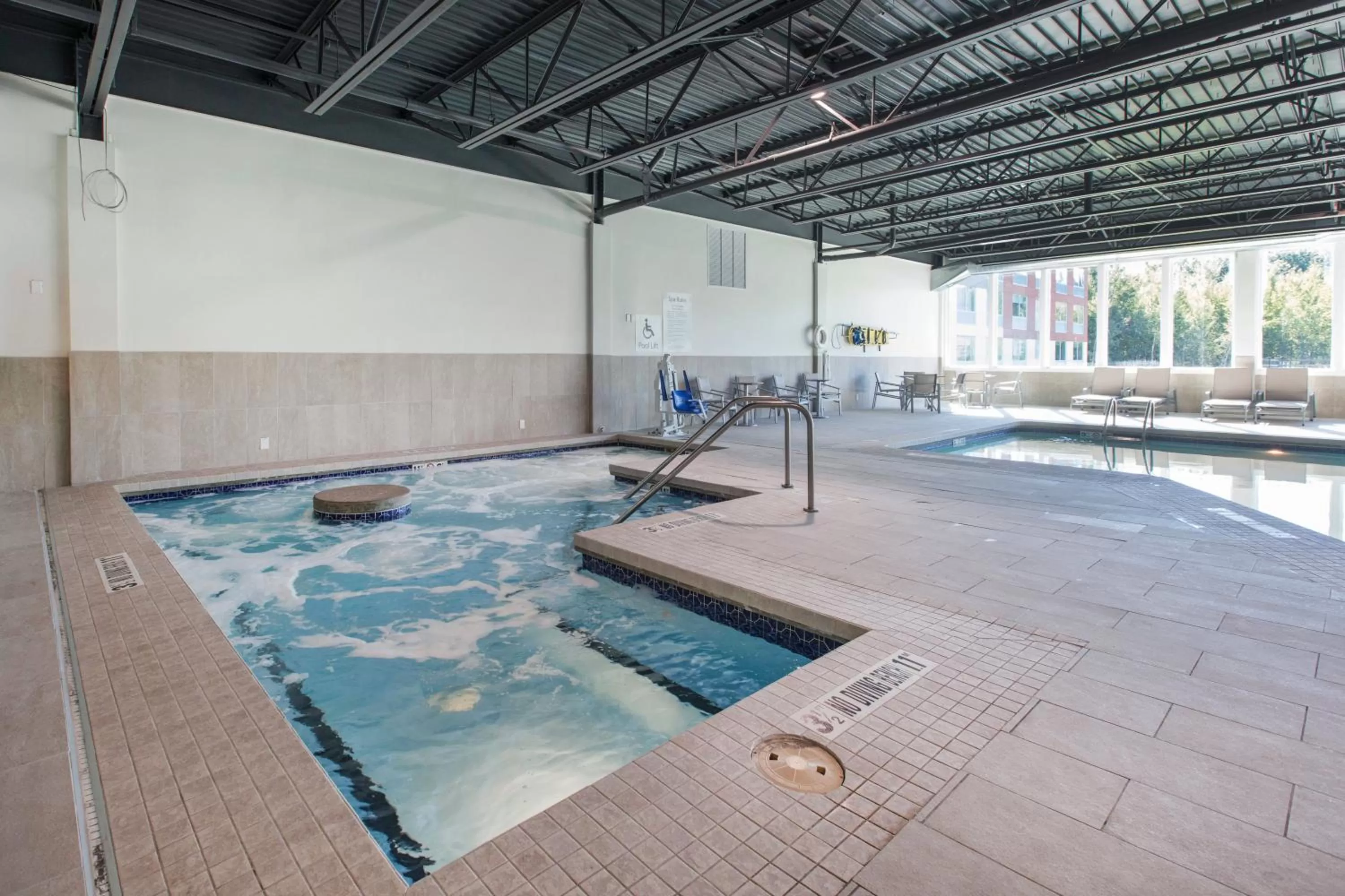 Swimming pool in Holiday Inn Express & Suites Ludington by IHG