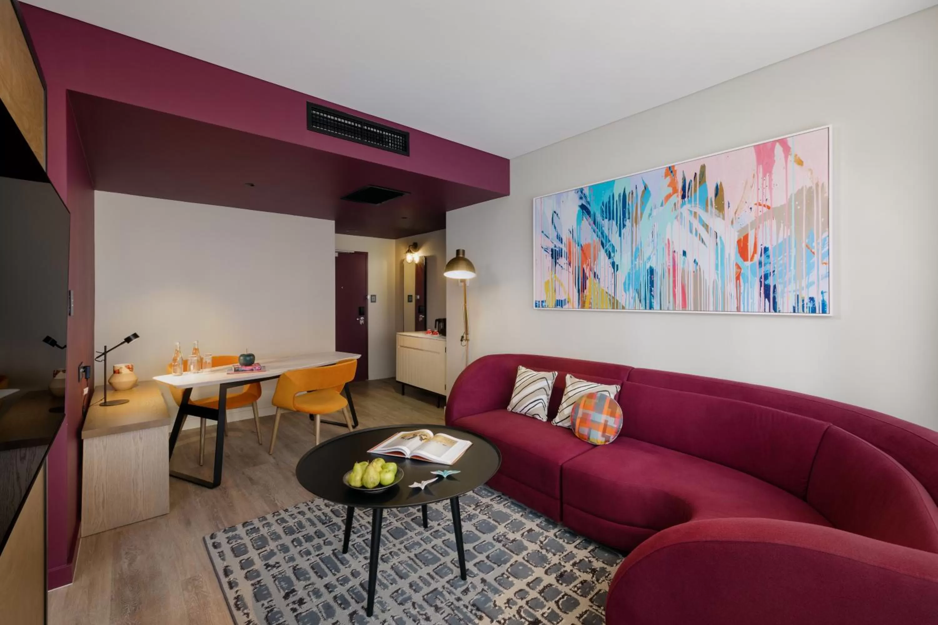 Seating area in Hotel Indigo Brisbane City Centre by IHG