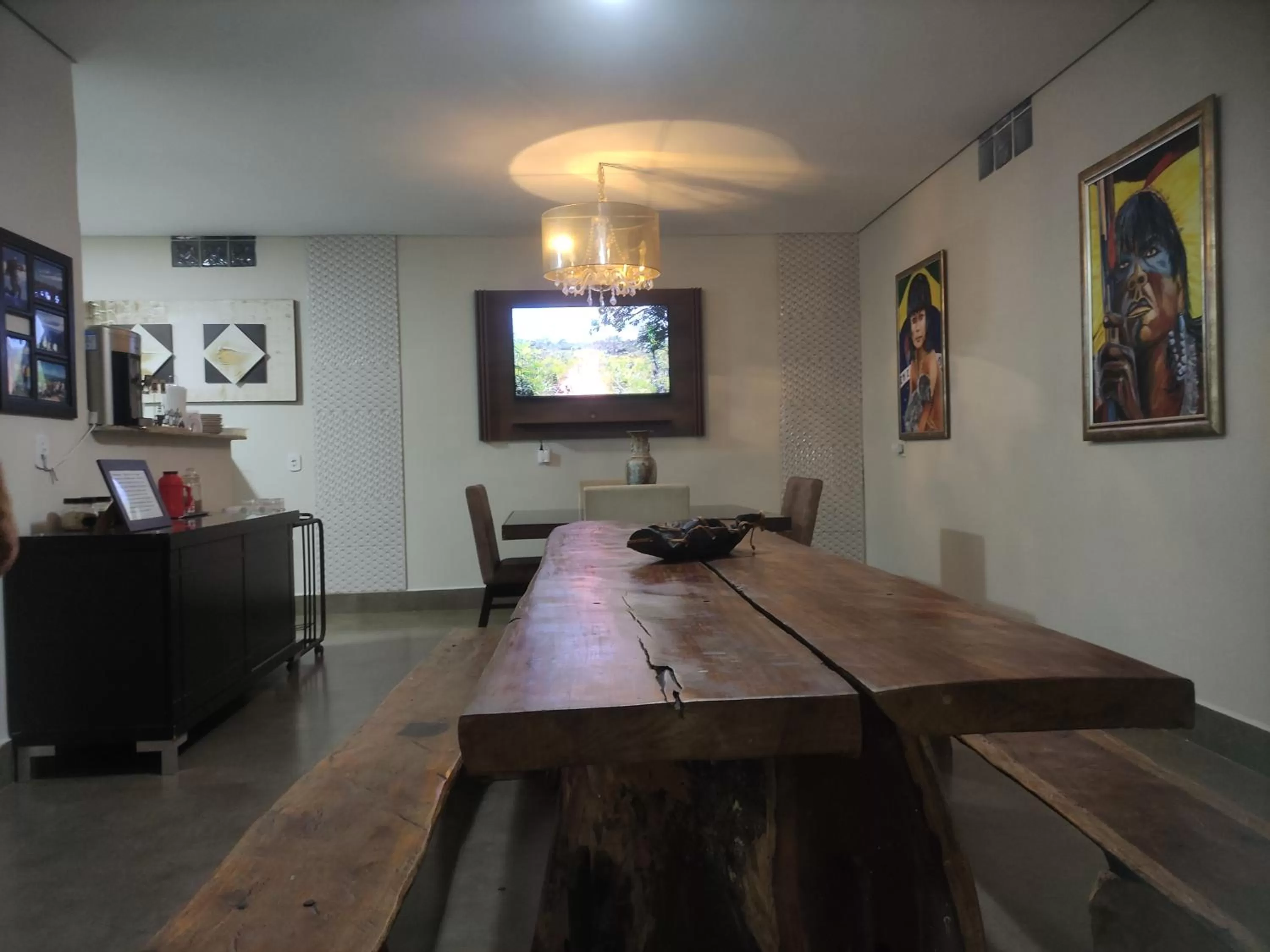 Living room in Pousada da Gi Suítes e Turismo