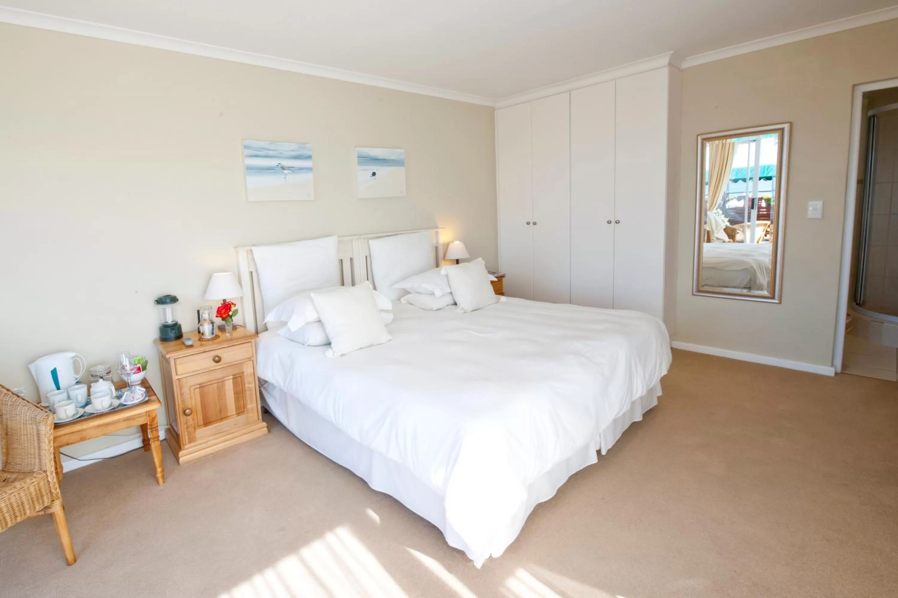 Bed in Dolphins' Playground Beachfront B&B