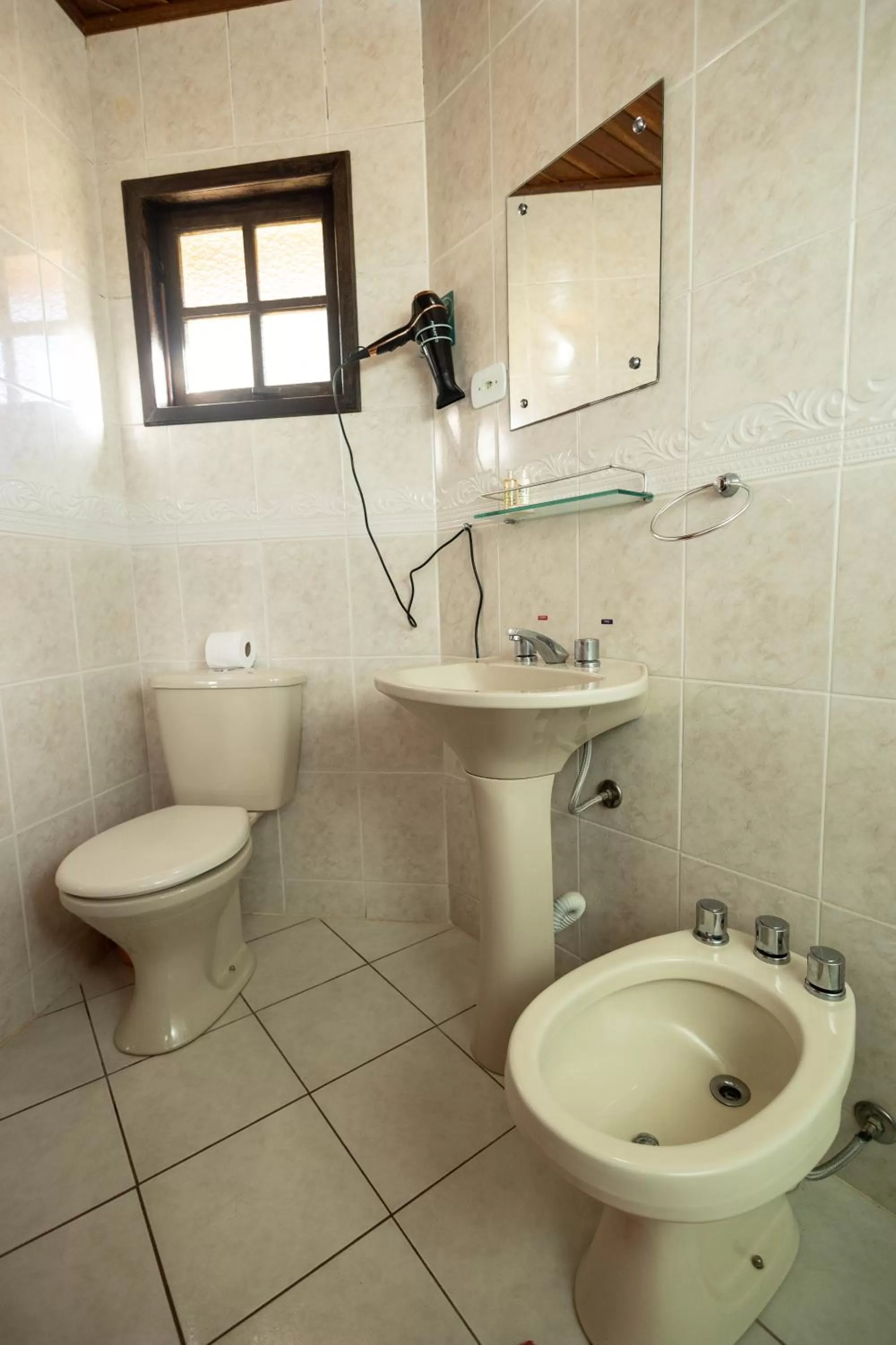 Bathroom in Chalés 3 Pinheiros