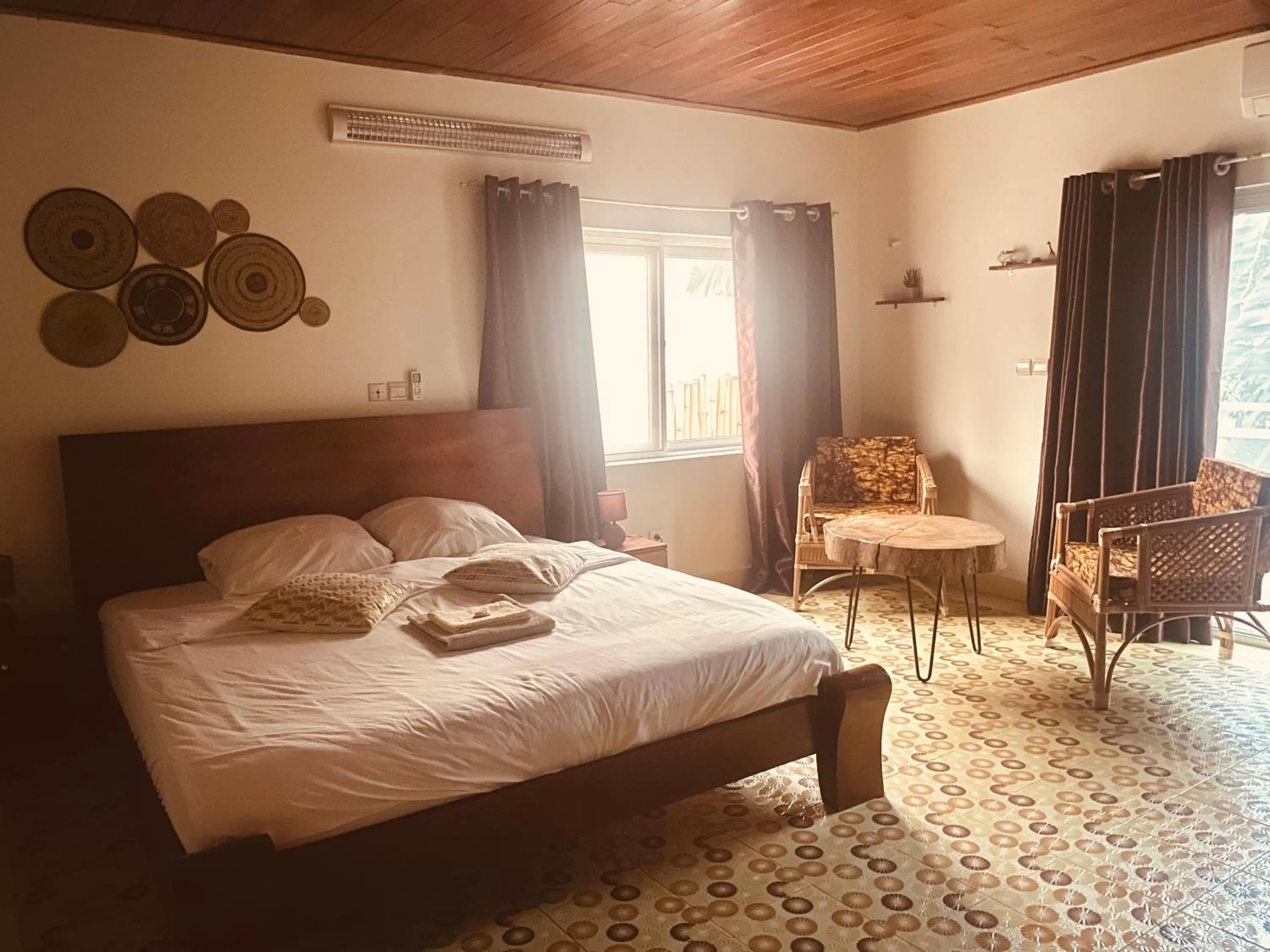 Bed in L'Oasis Guesthouse