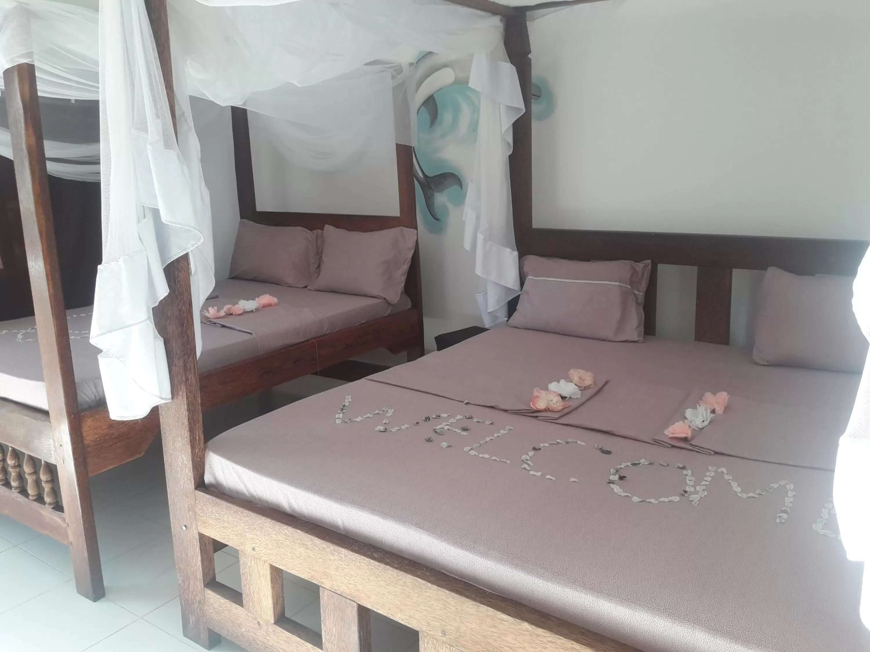 Photo of the whole room, Bed in Ebony & Ivory Beach Bungalows