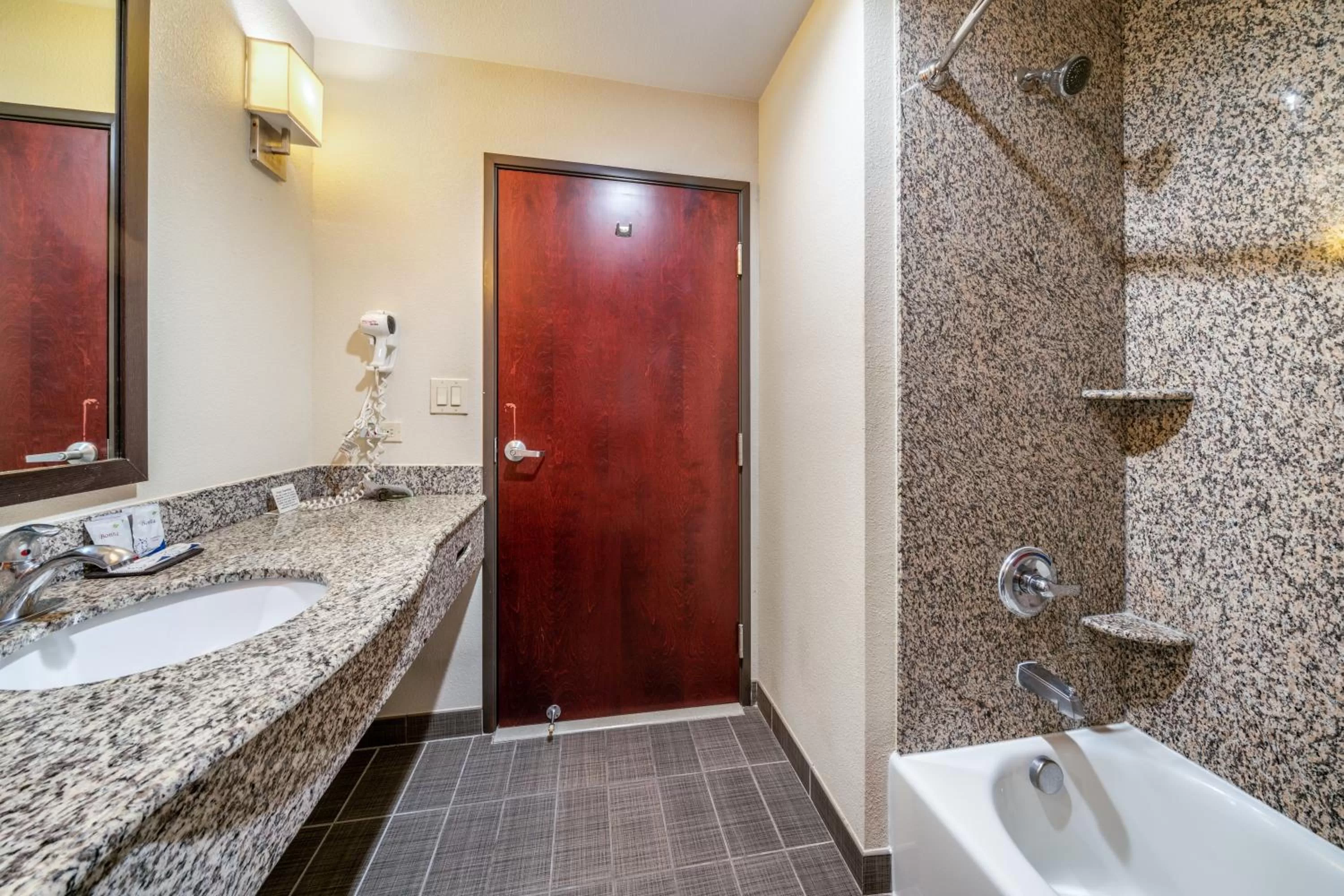 Bathroom in Restwell Inn & Suites I-45 North