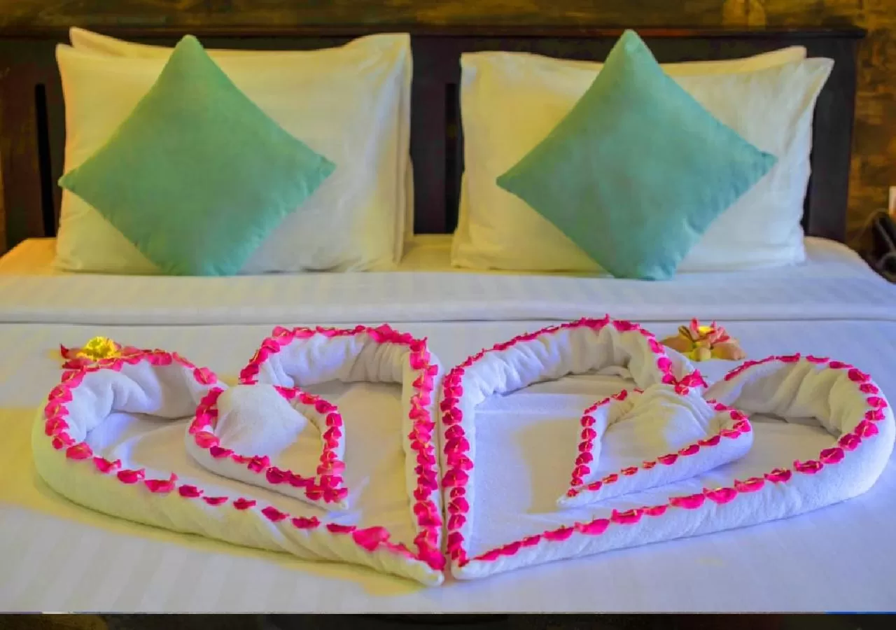 Bed in Ladear Privilege Rooms