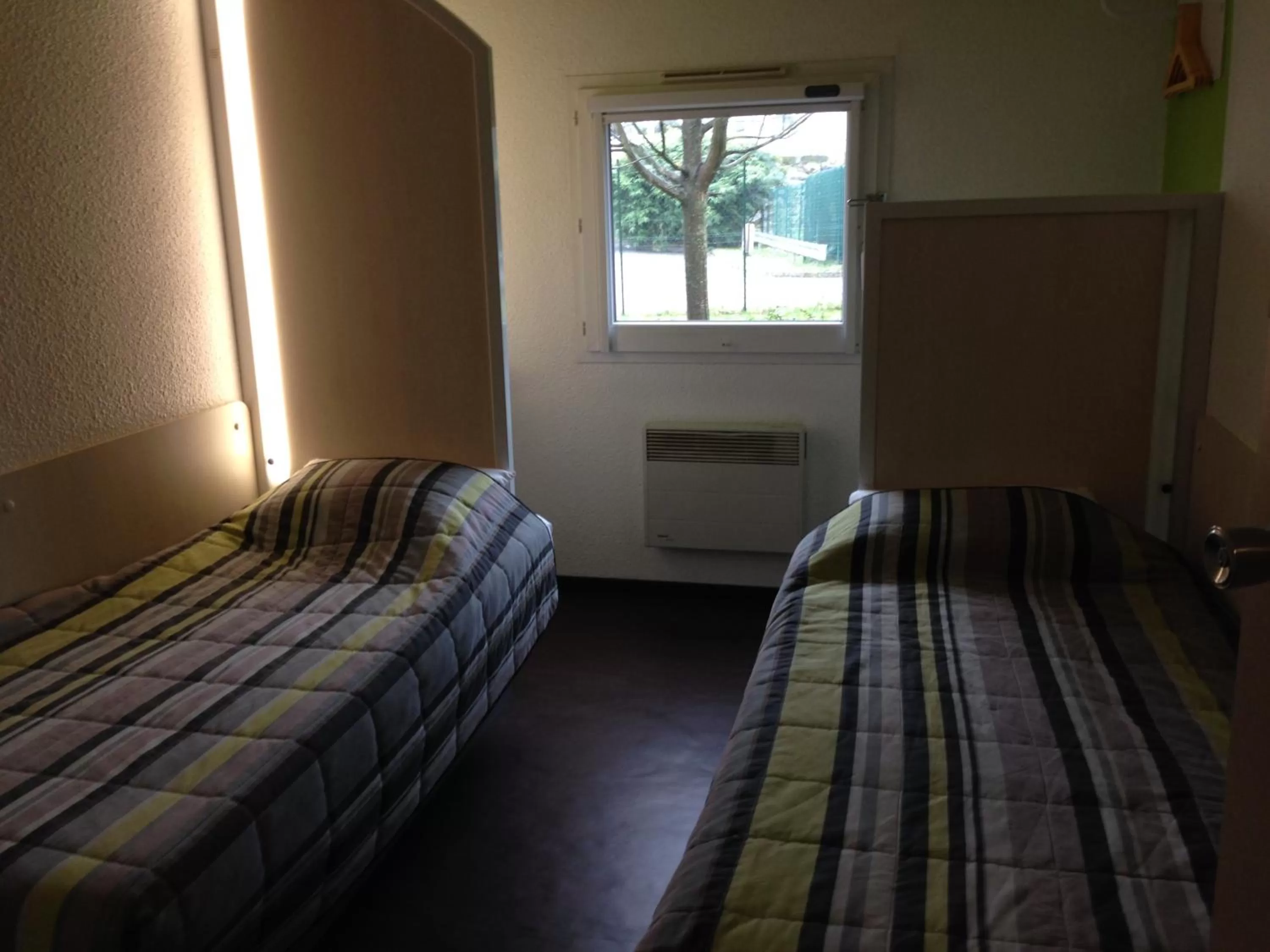 Bedroom, Bed in hotelF1 Saint Etienne Est La Grand Croix