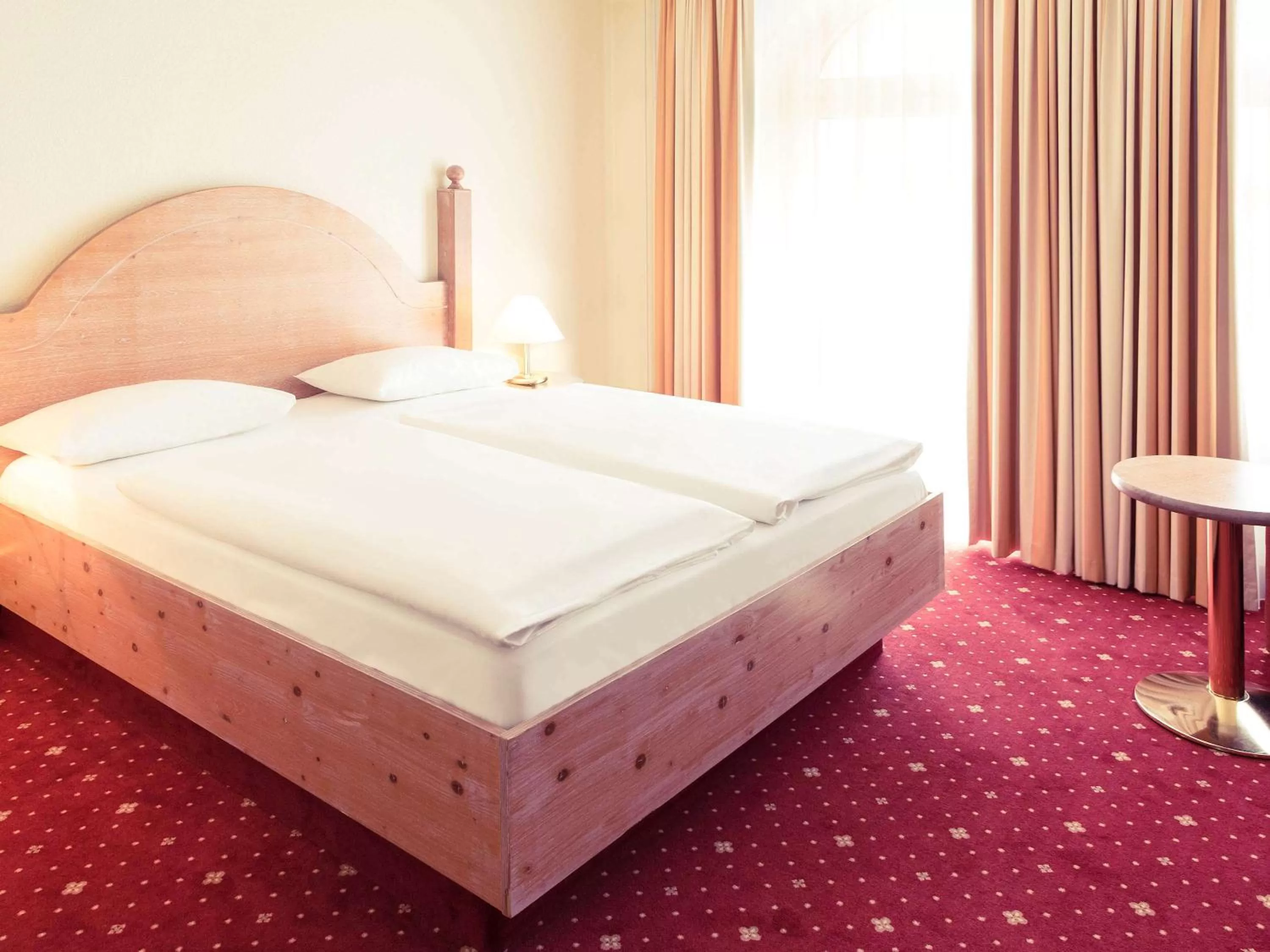 Photo of the whole room, Bed in Mercure Hotel Berlin Mitte