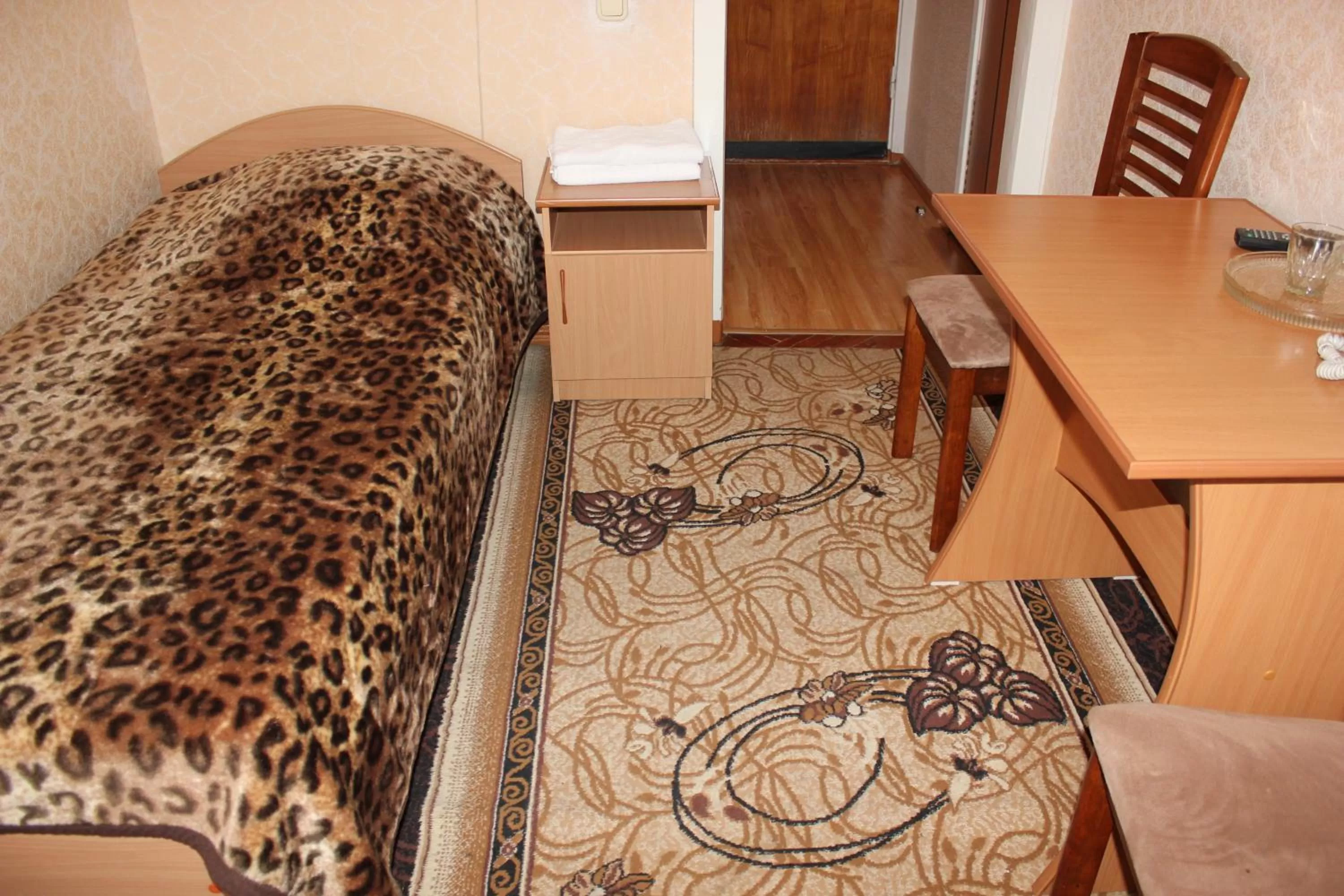 Photo of the whole room, Bed in Ust-Kamenogorsk Hotel
