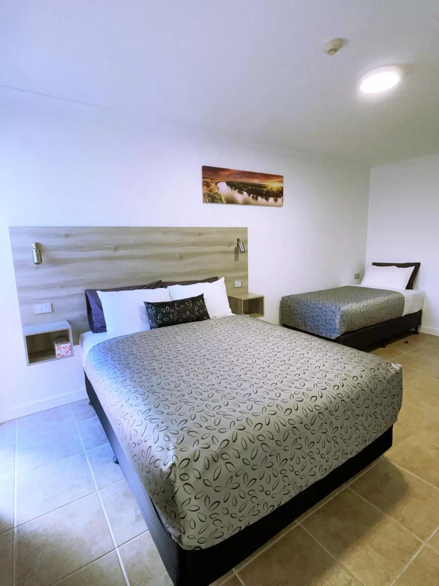 Bed in Childers Oasis Motel