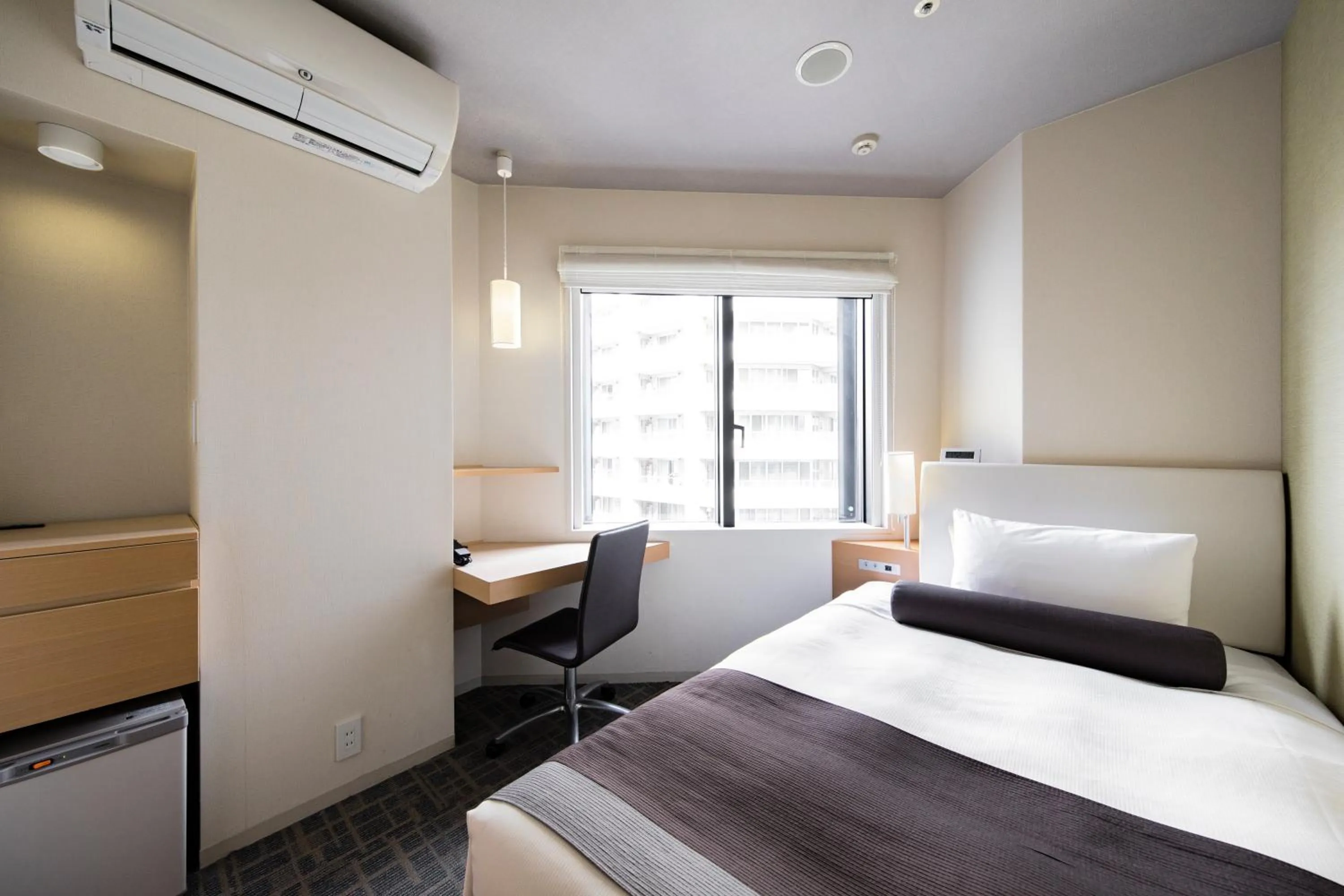 Bed in Tokyu Stay Kamata - Tokyo Haneda