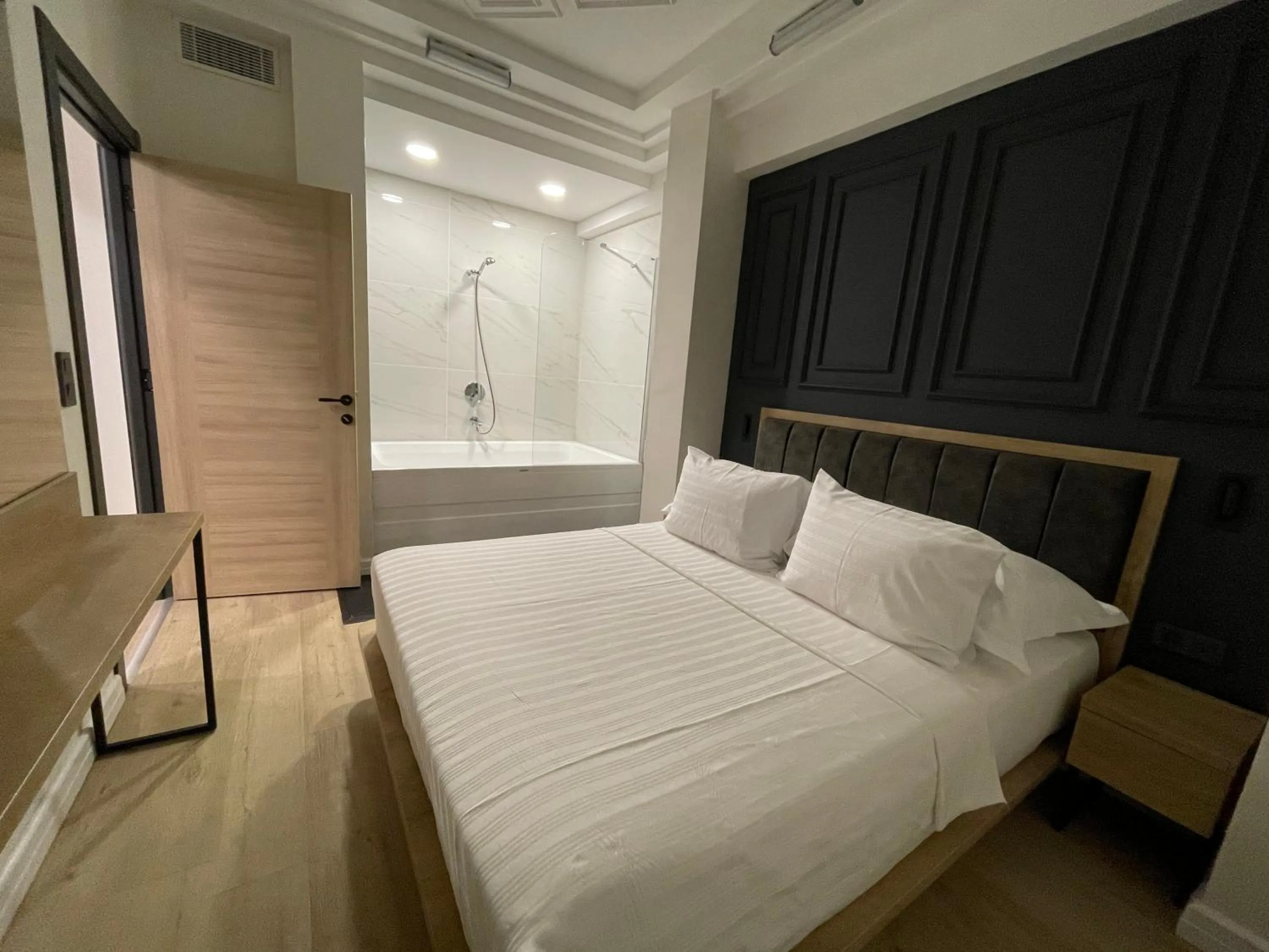 Bed in RW BOUTIQUE HOTEL