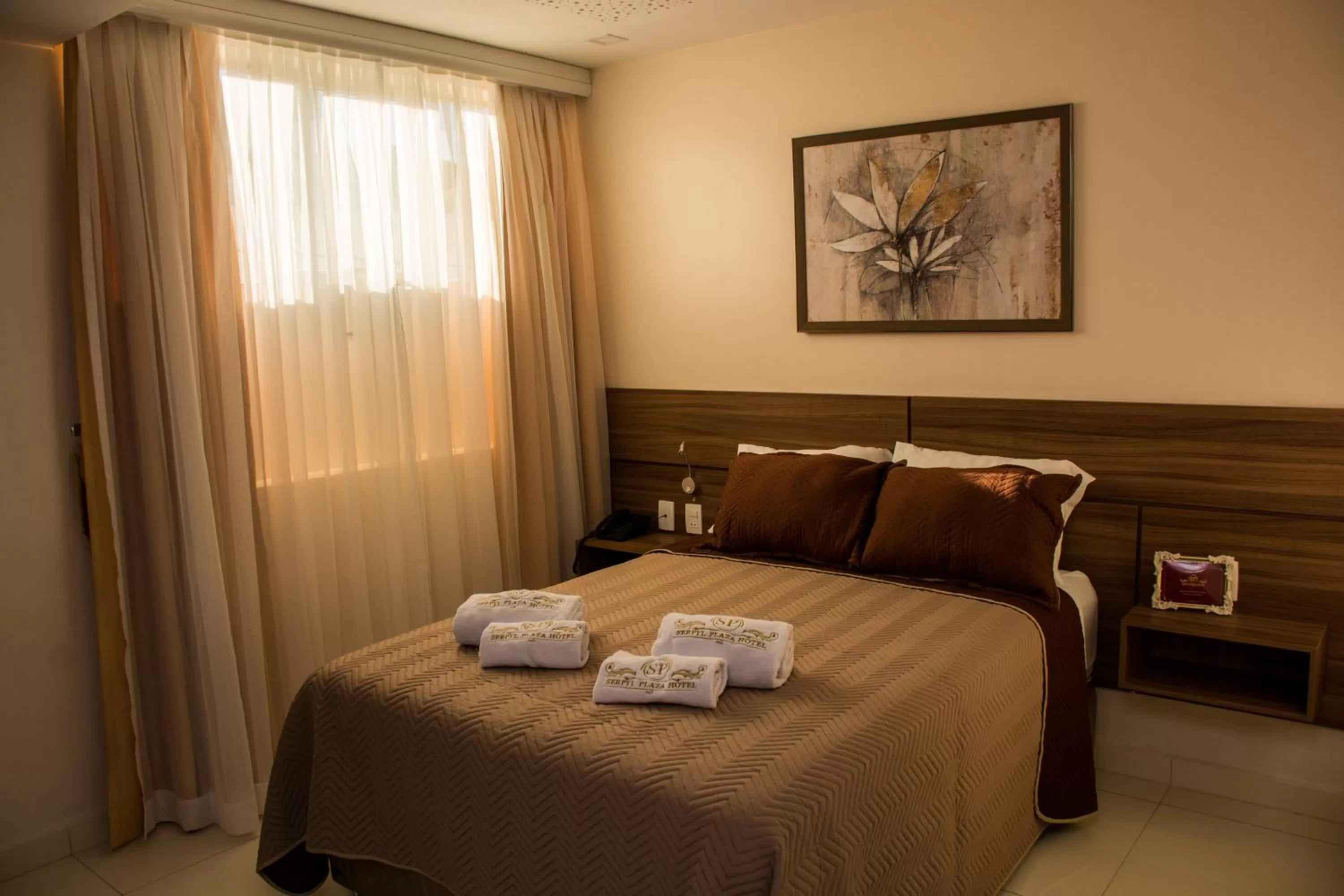 Bed in SERPYL Plaza Hotel