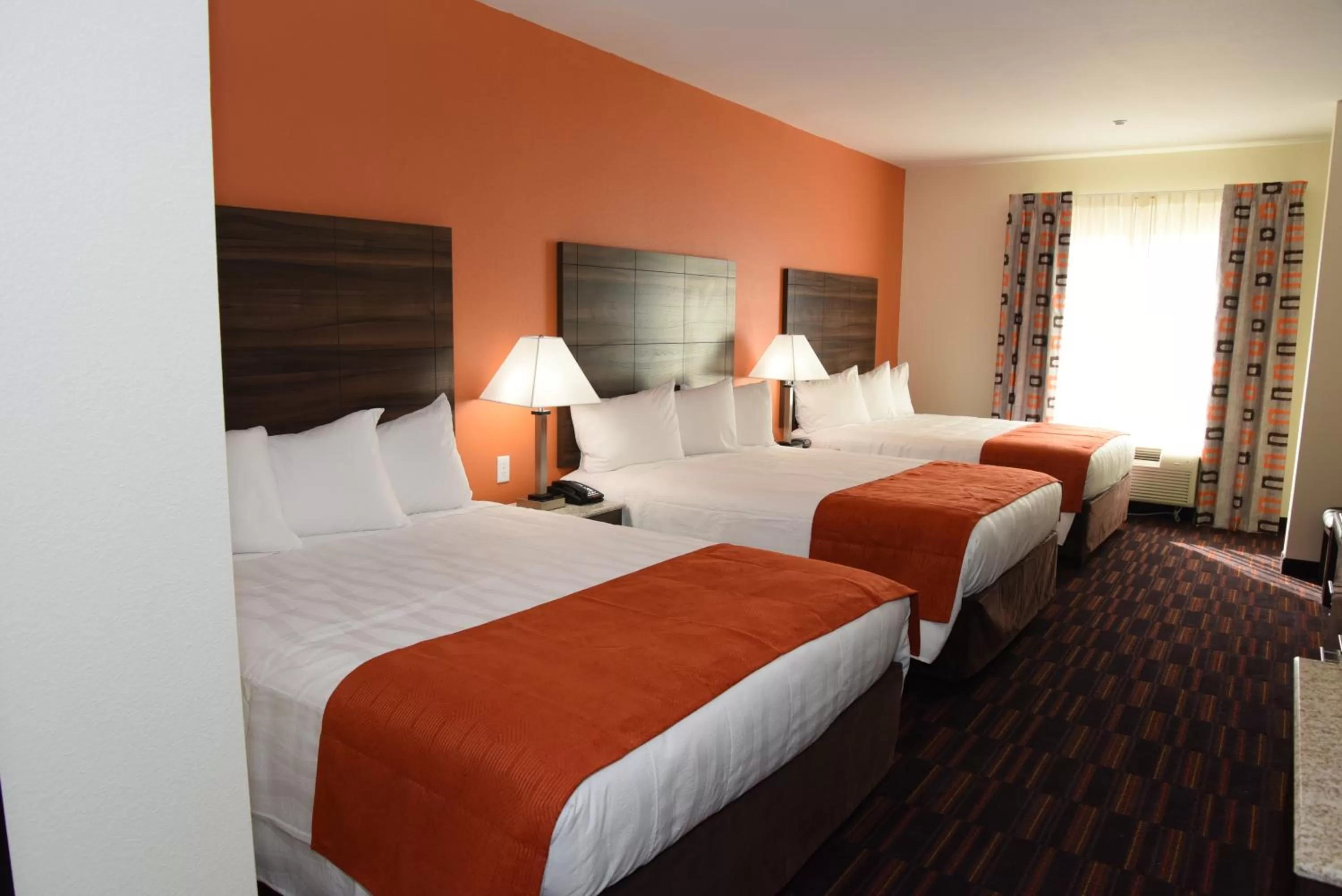 Bed in Home Away Kitchen Suites Enid