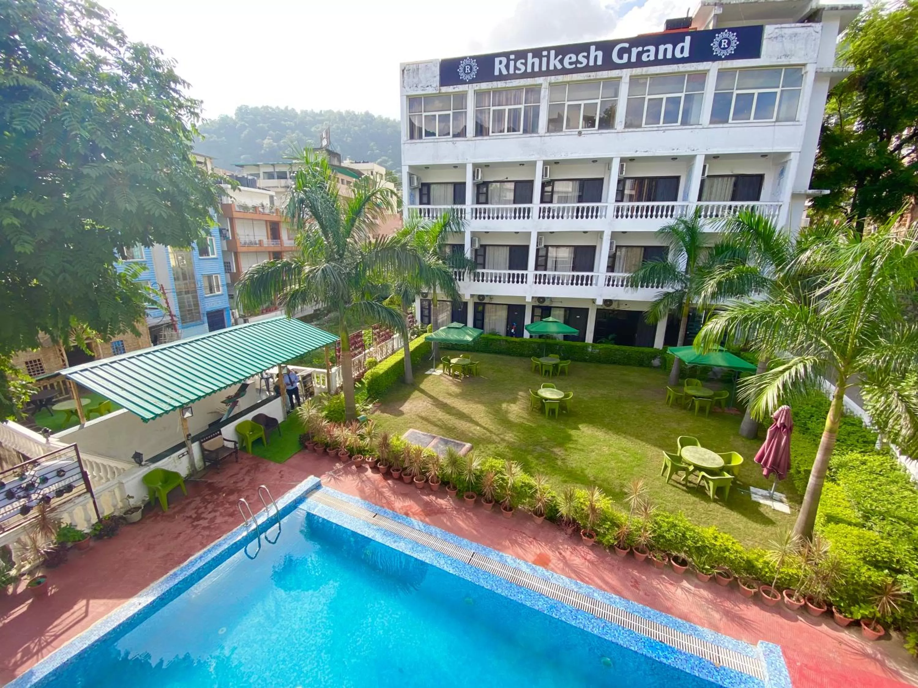Swimming pool in Hotel Rishikesh Grand by Kool Stays