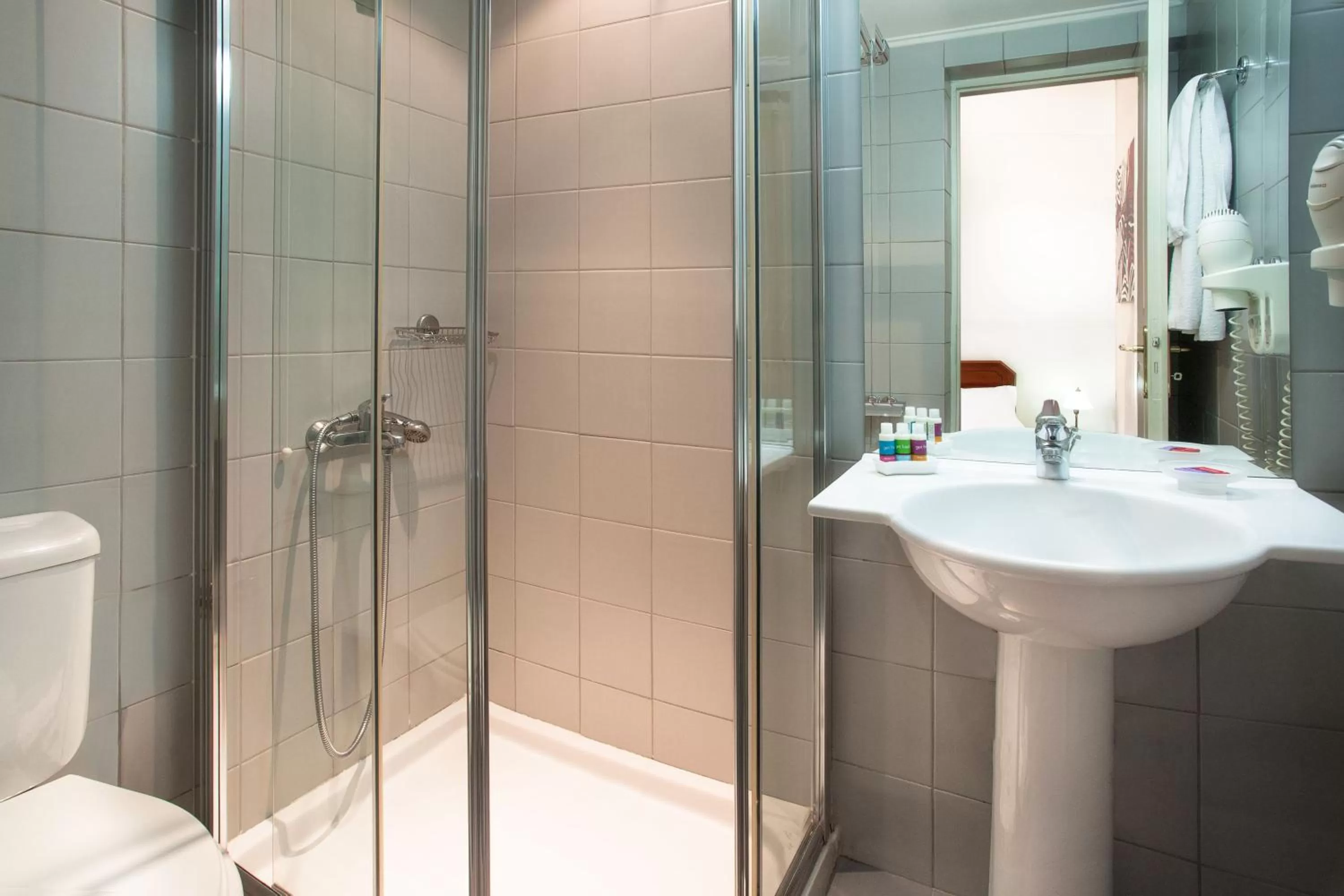 Bathroom in Arni Hotel Domotel