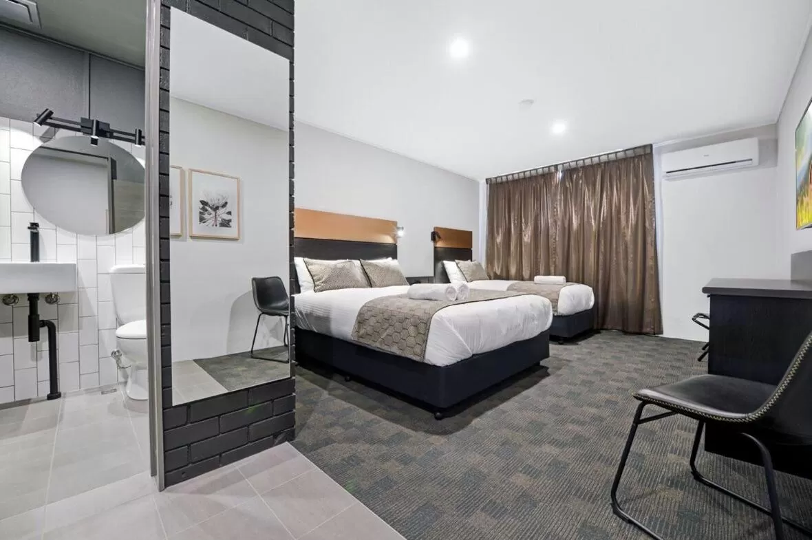 Photo of the whole room, Bed in CBD Motor Inn