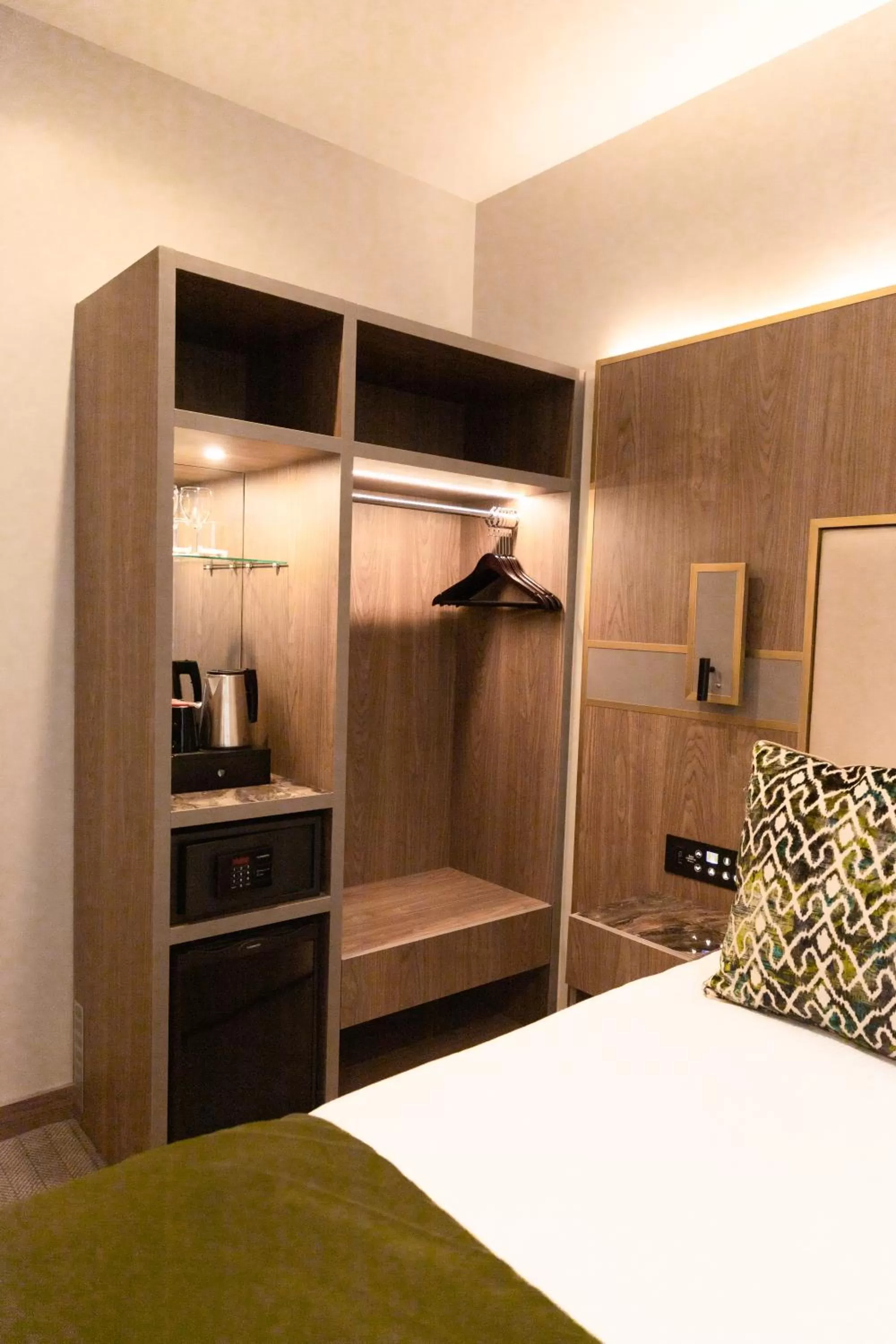 Bed in Merit Kensington Hotel