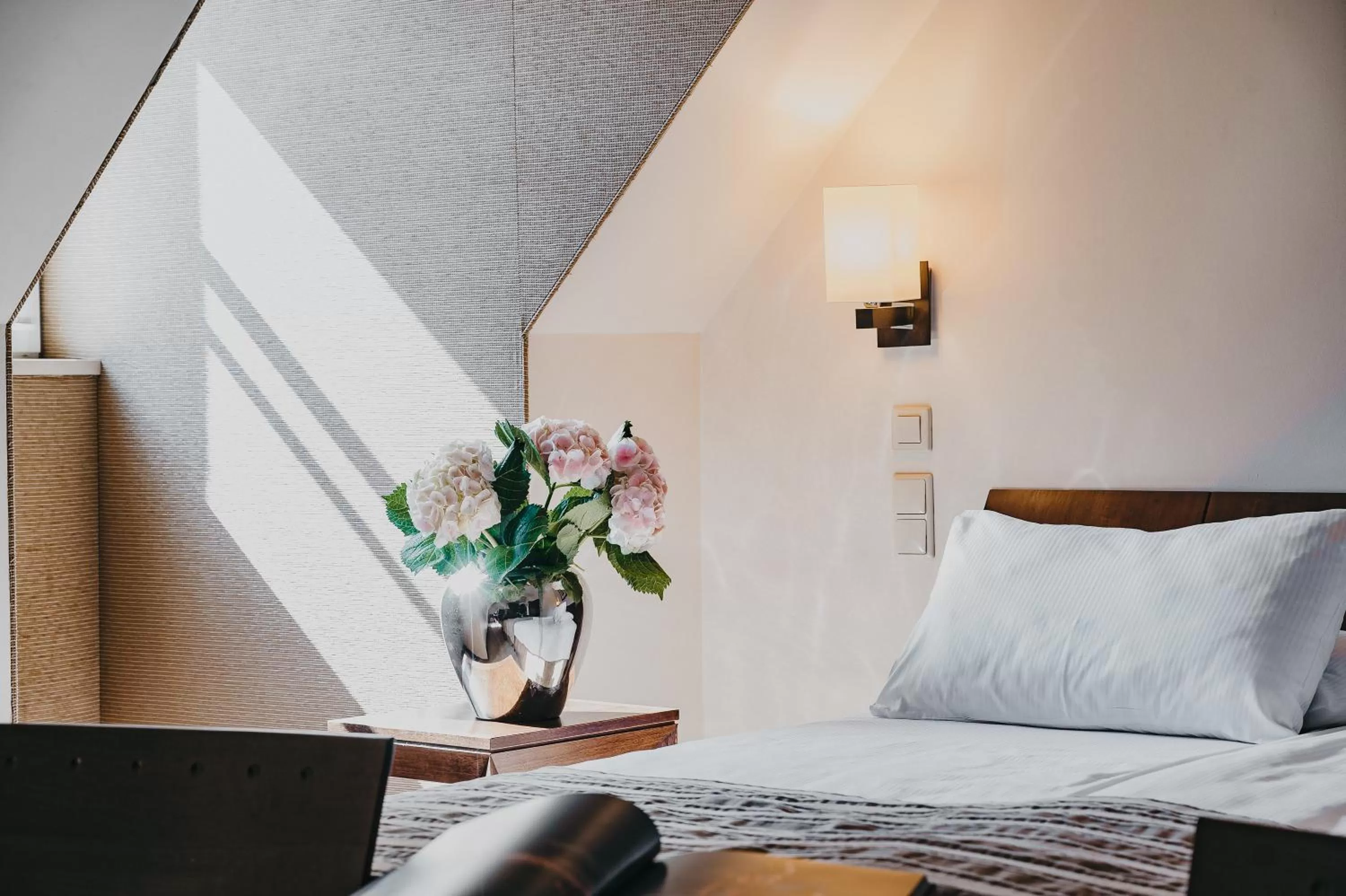 Bed in Mamaison Le Regina Boutique Hotel