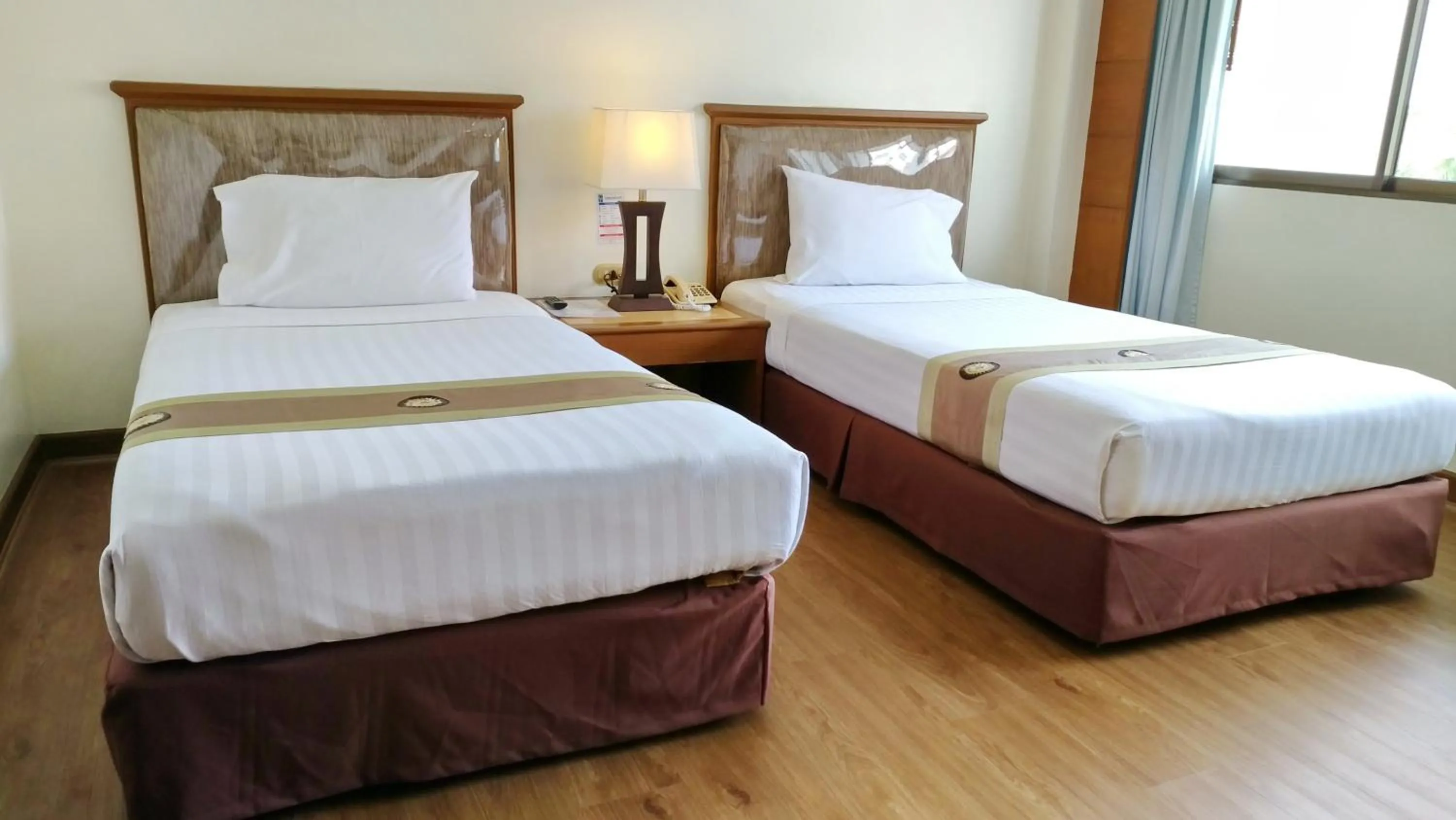 Bed in Grand Park Hotel