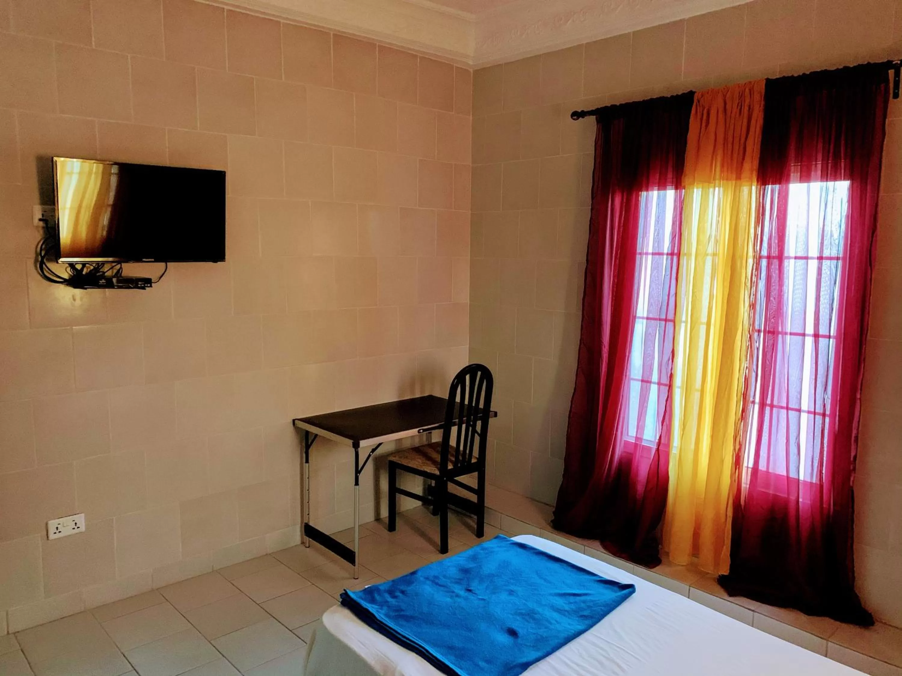 Bed in Woodpecker Resort Hotel