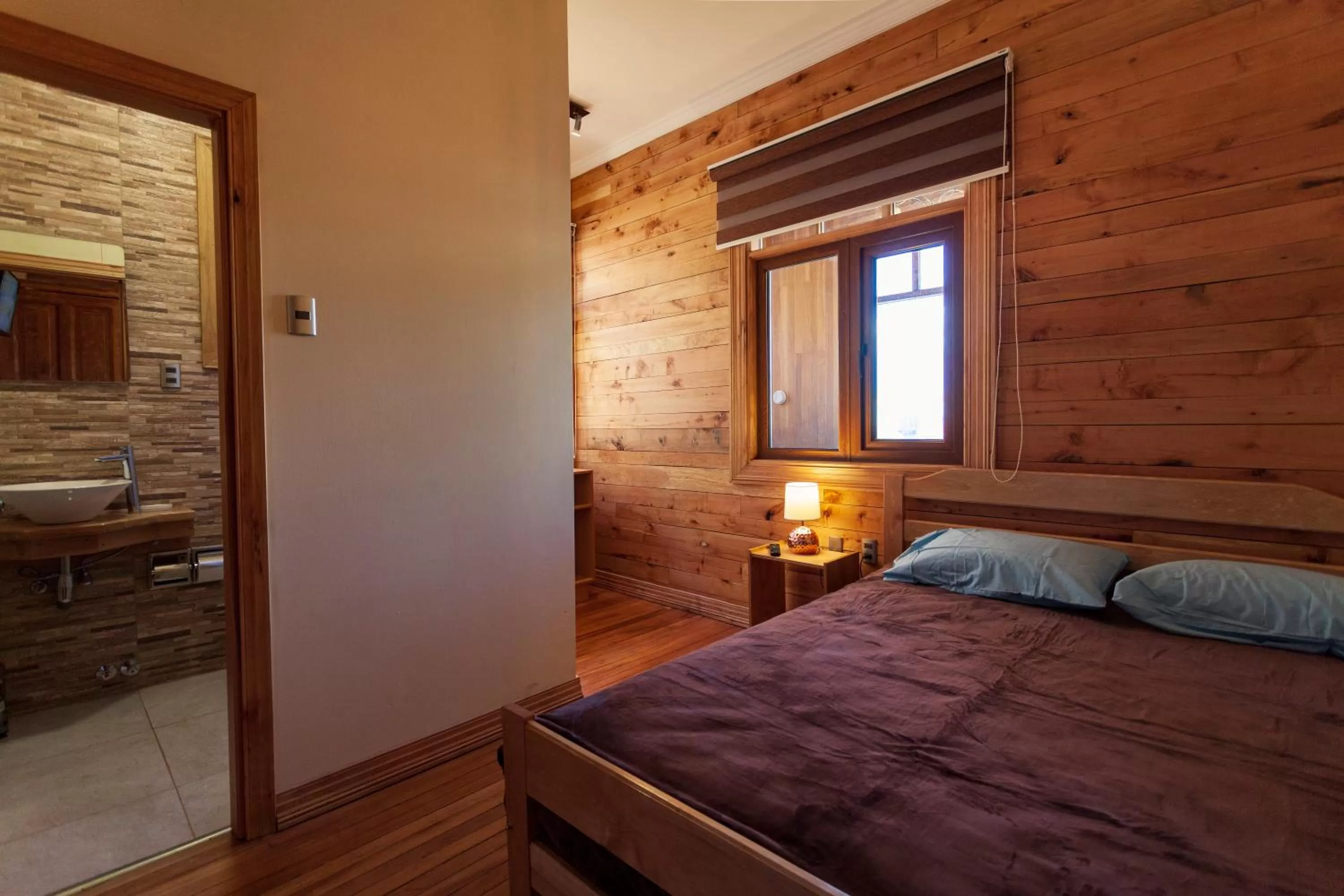Photo of the whole room, Bed in Hostal Boutique Patagonia Mística
