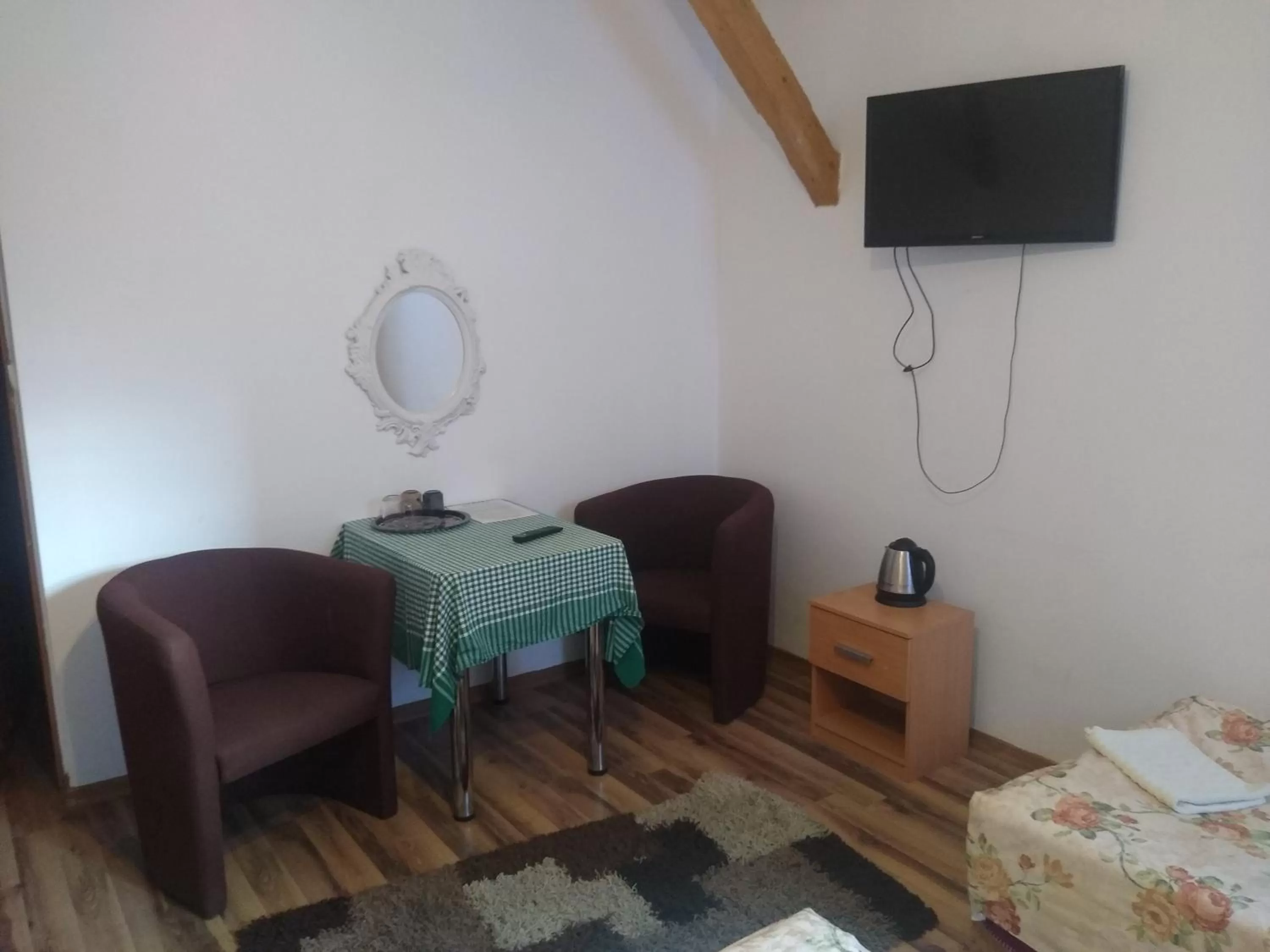 Communal lounge/ TV room, TV/Entertainment Center in Zajazd Eljan-Centrum Noclegowe