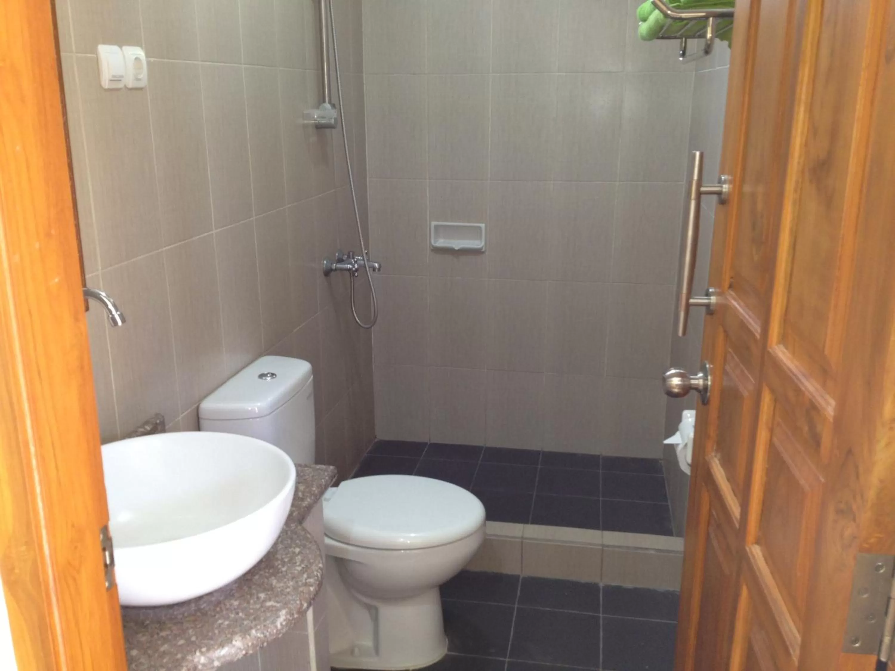 Bathroom in Astina Hotel