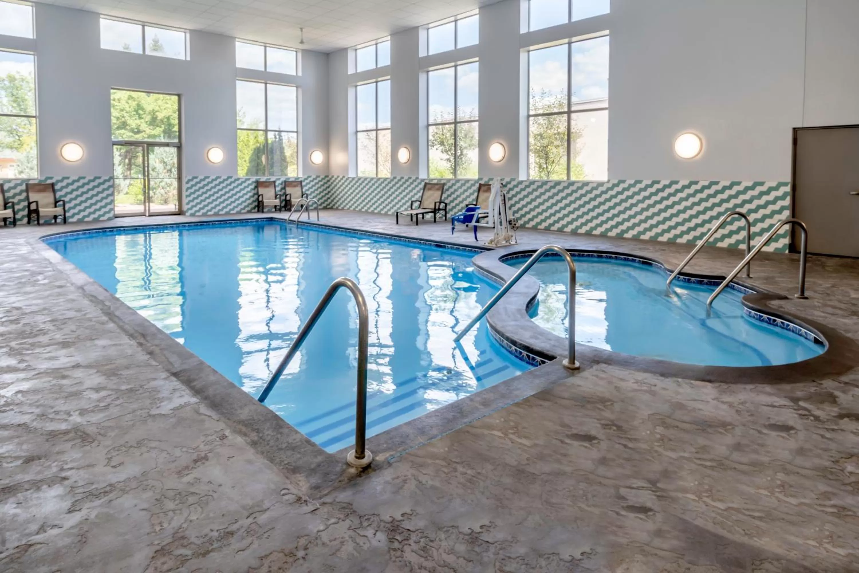 Swimming pool in Holiday Inn & Suites Wausau-Rothschild by IHG