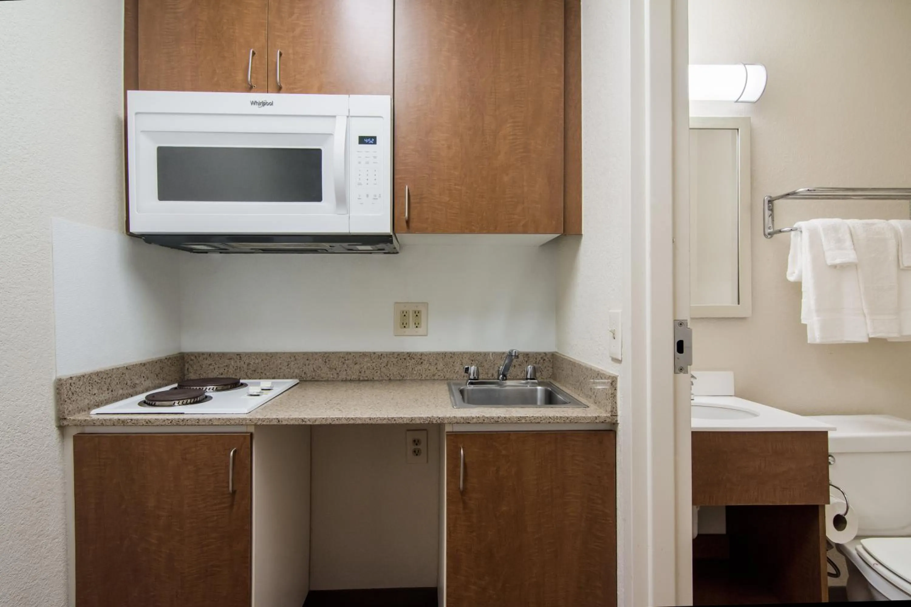 Photo of the whole room in HomeTowne Studios by Red Roof Raleigh – Durham