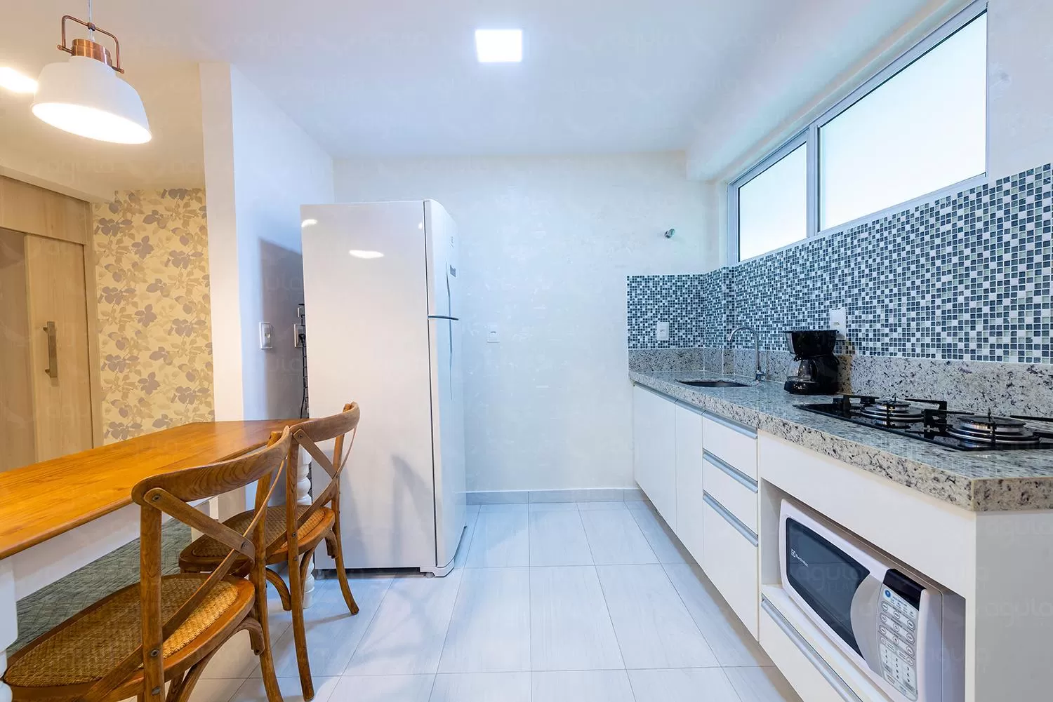 Kitchen/Kitchenette in Águia Flats Pousada