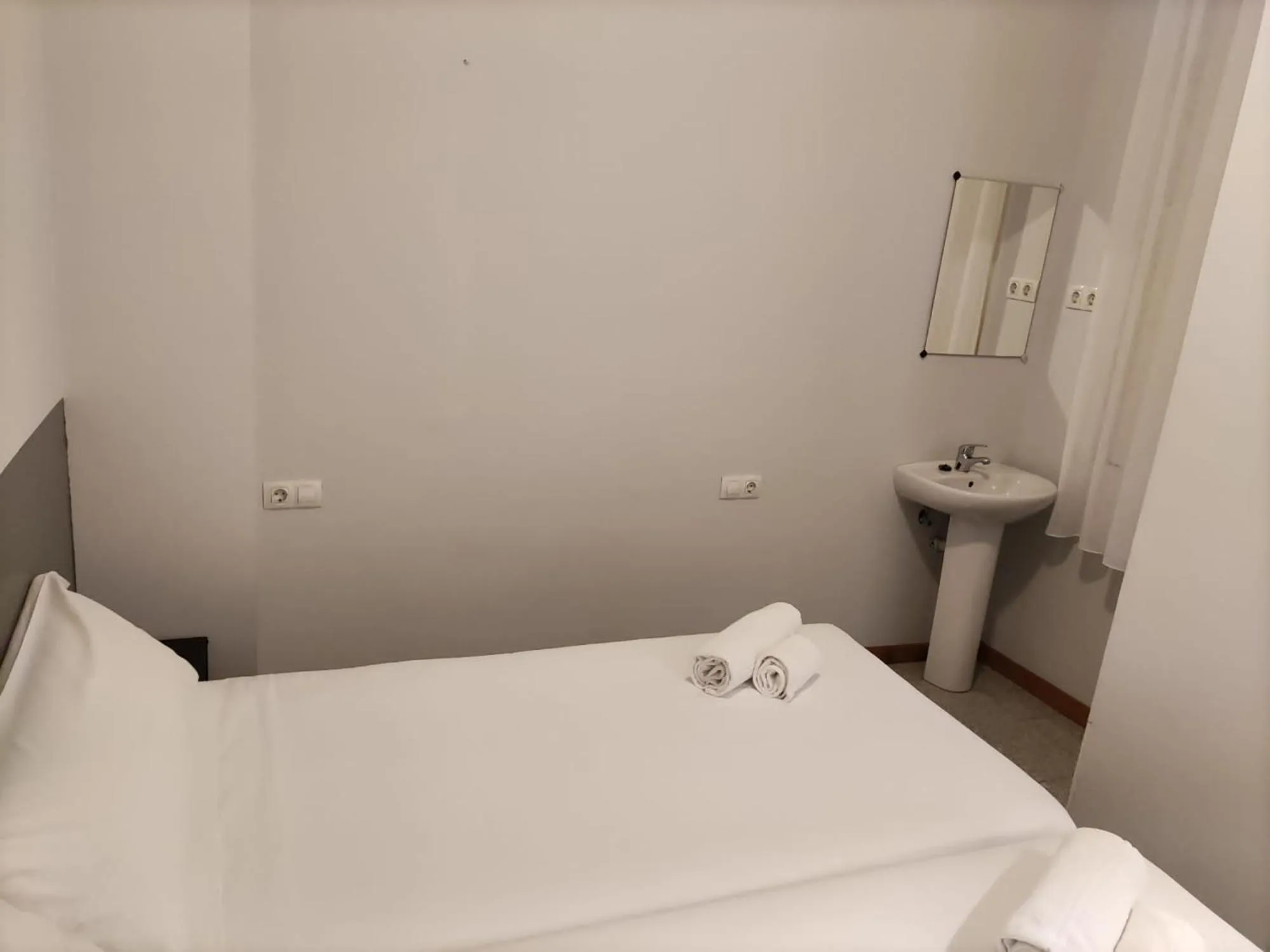 Bed in Hotel Monegal