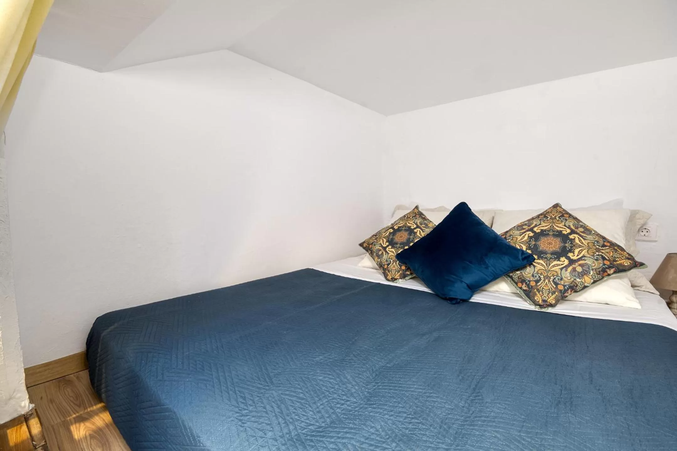 Bed in Mascot Garden Rooms