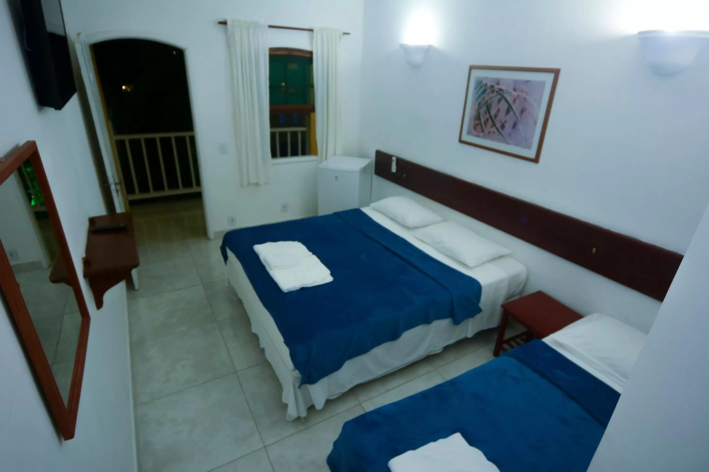 Bed in Pousada Estrela de Paraty