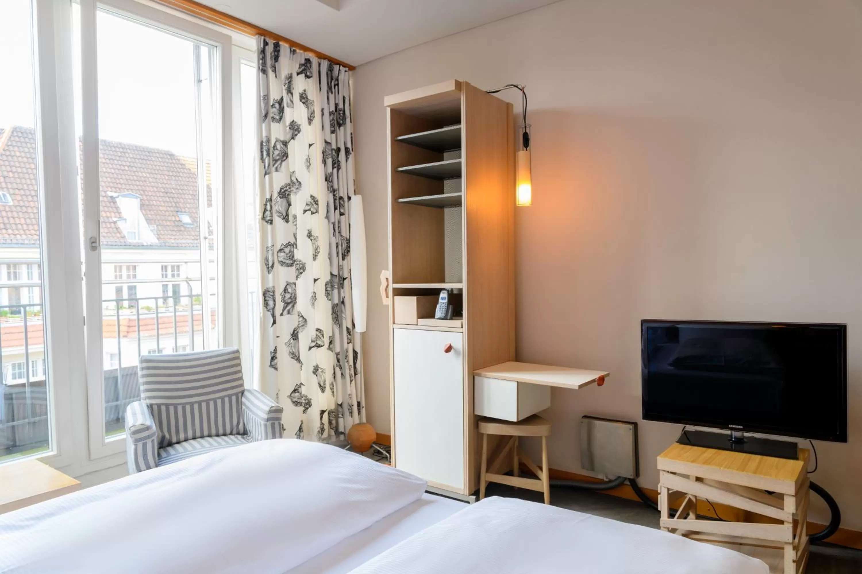 Bed in Hotel Bleibtreu Berlin by Golden Tulip