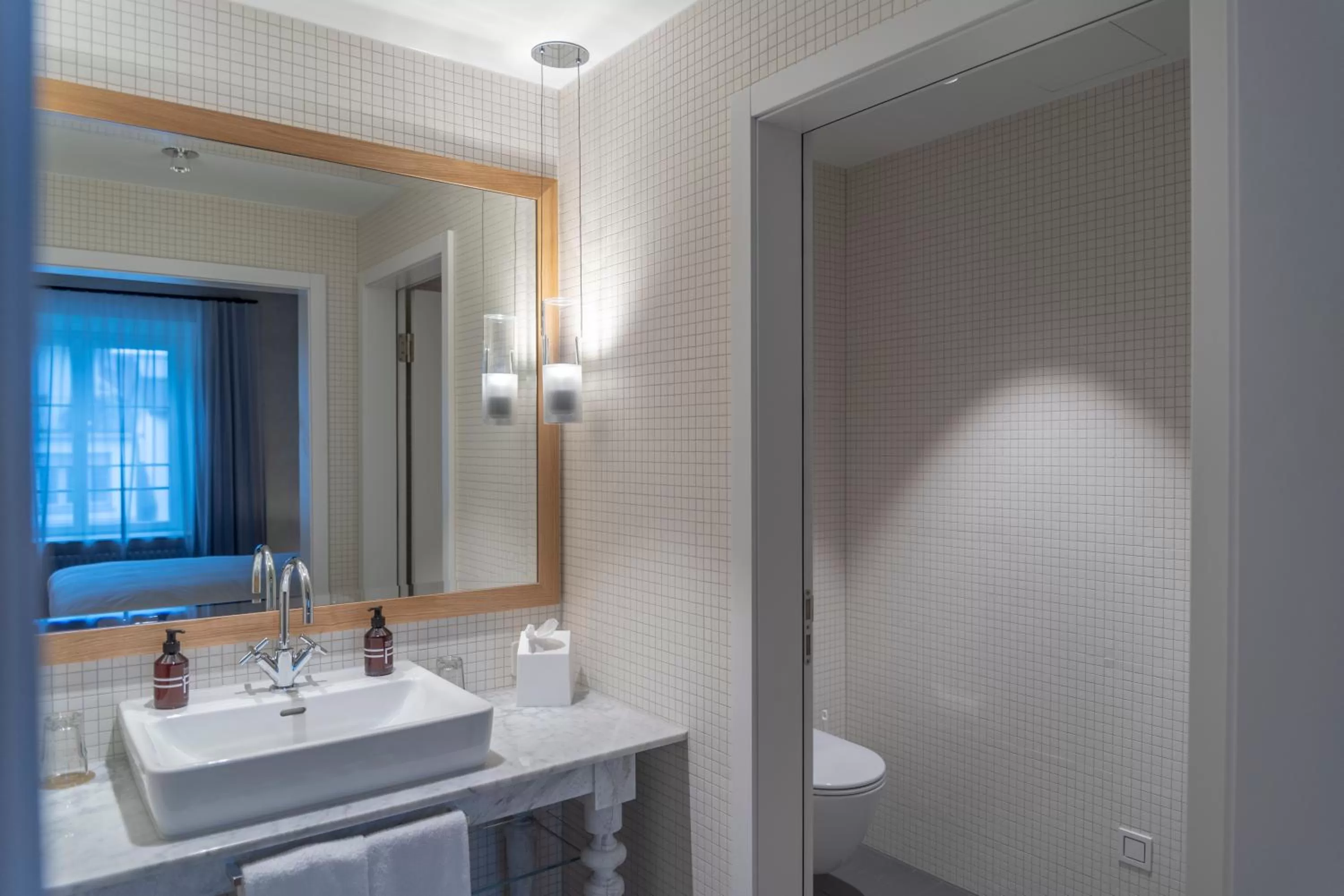 Bathroom in CASPAR Swiss Quality Hotel