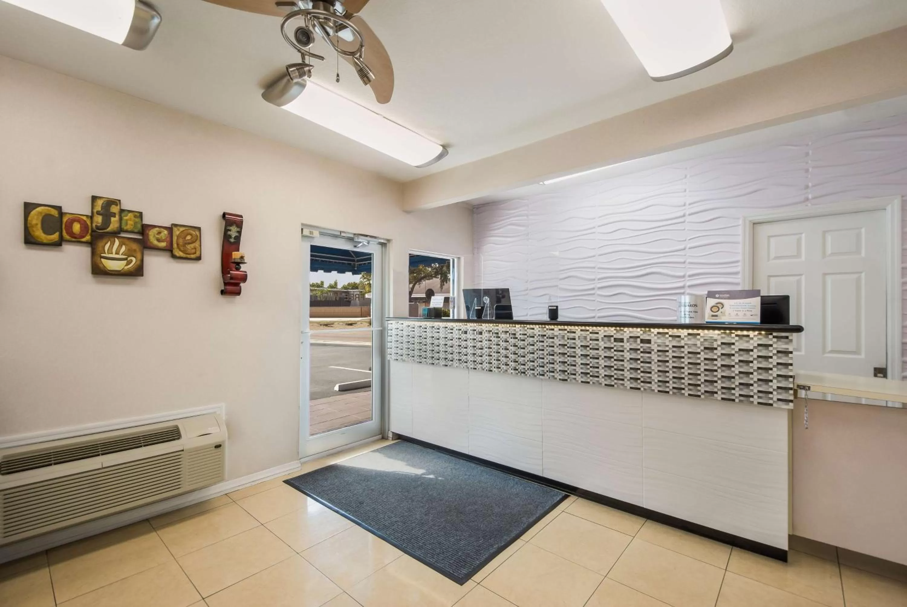 Lobby or reception in SureStay Hotel by Best Western Sarasota Lido Beach