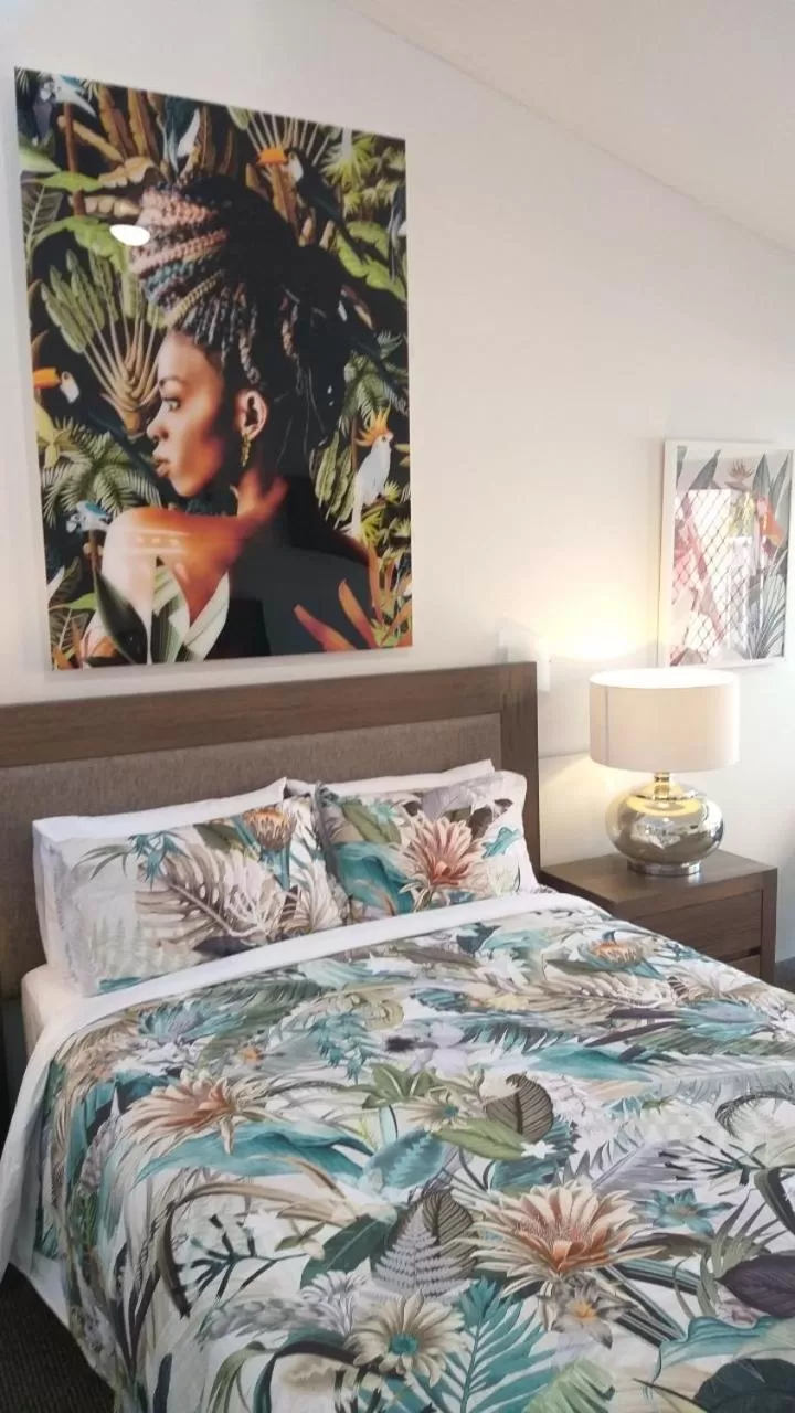 Bed in Private Suite Nautilus Beach Front Resort